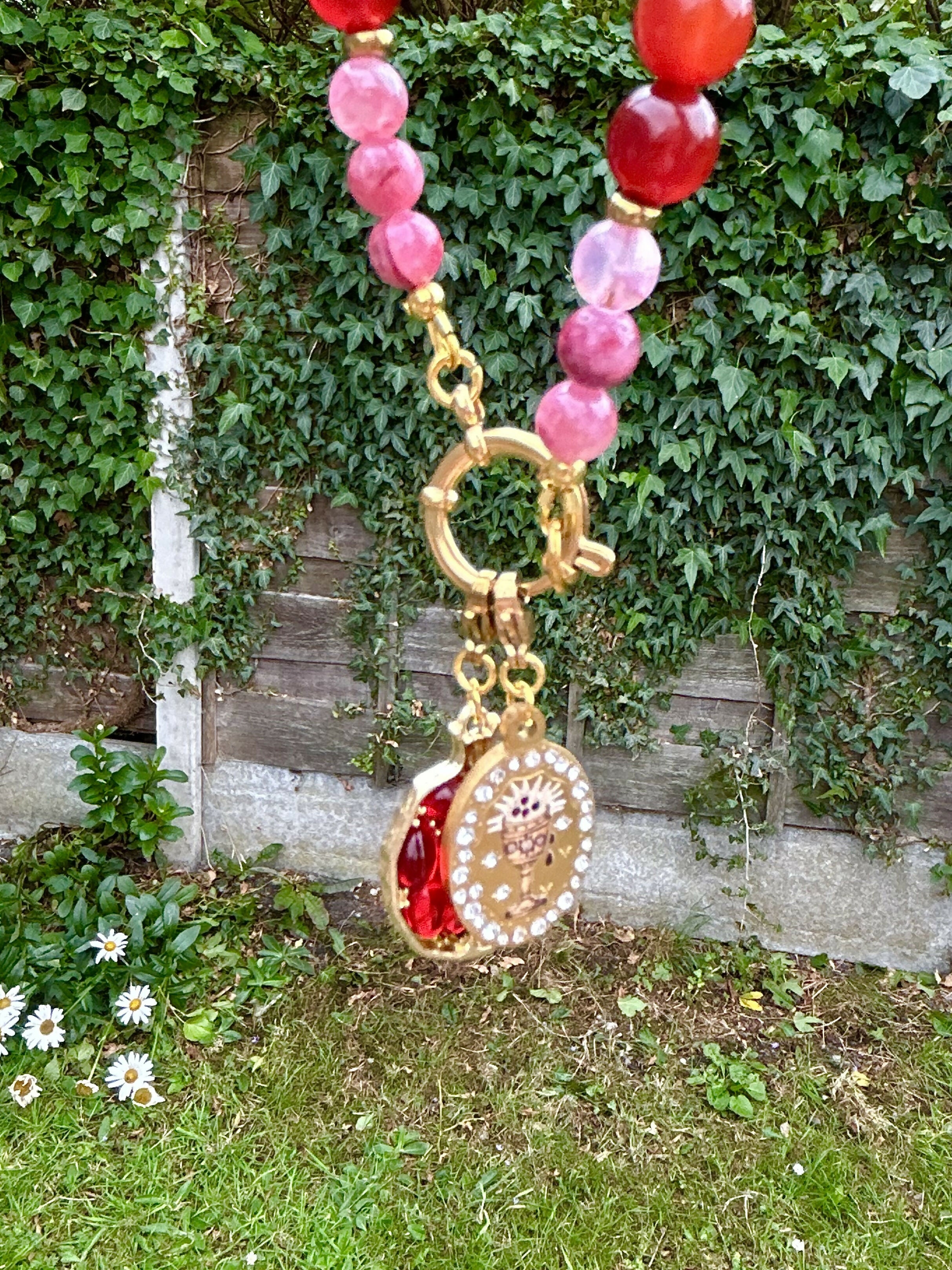 Extra long natural stone and hematite charm necklace