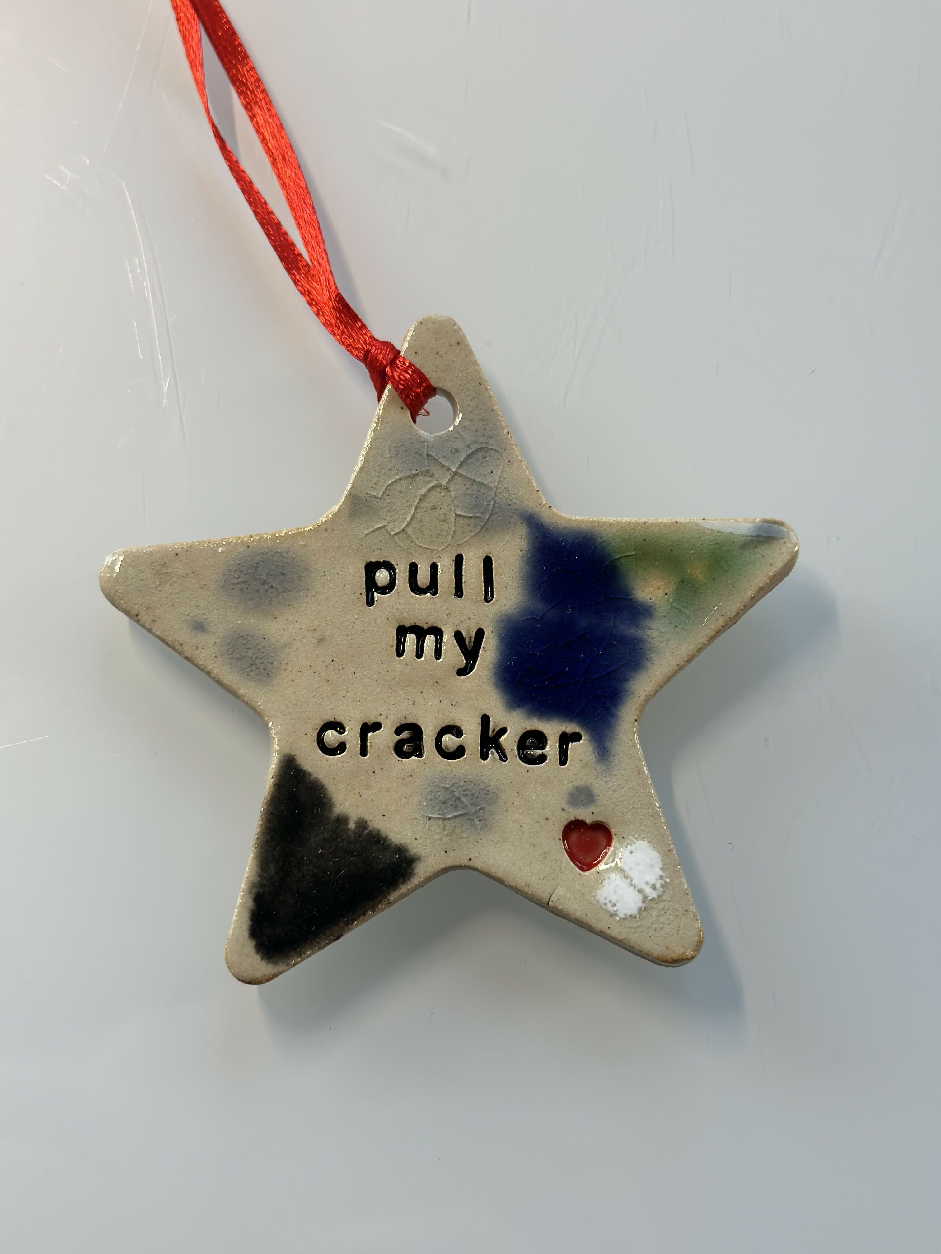 PULL MY CRACKER STAR DECORATION