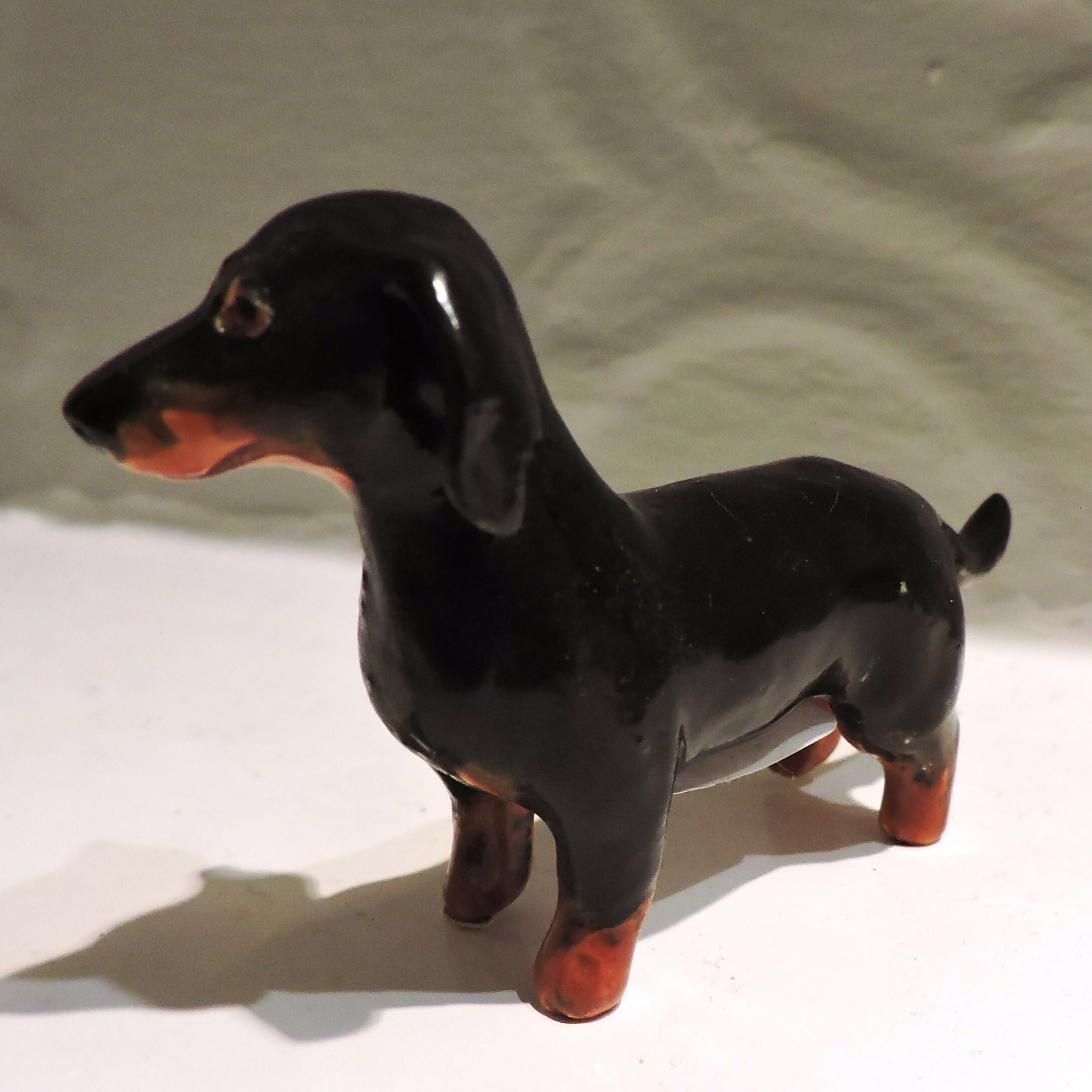 Ceramic Black and tan dachshund dog sculpture