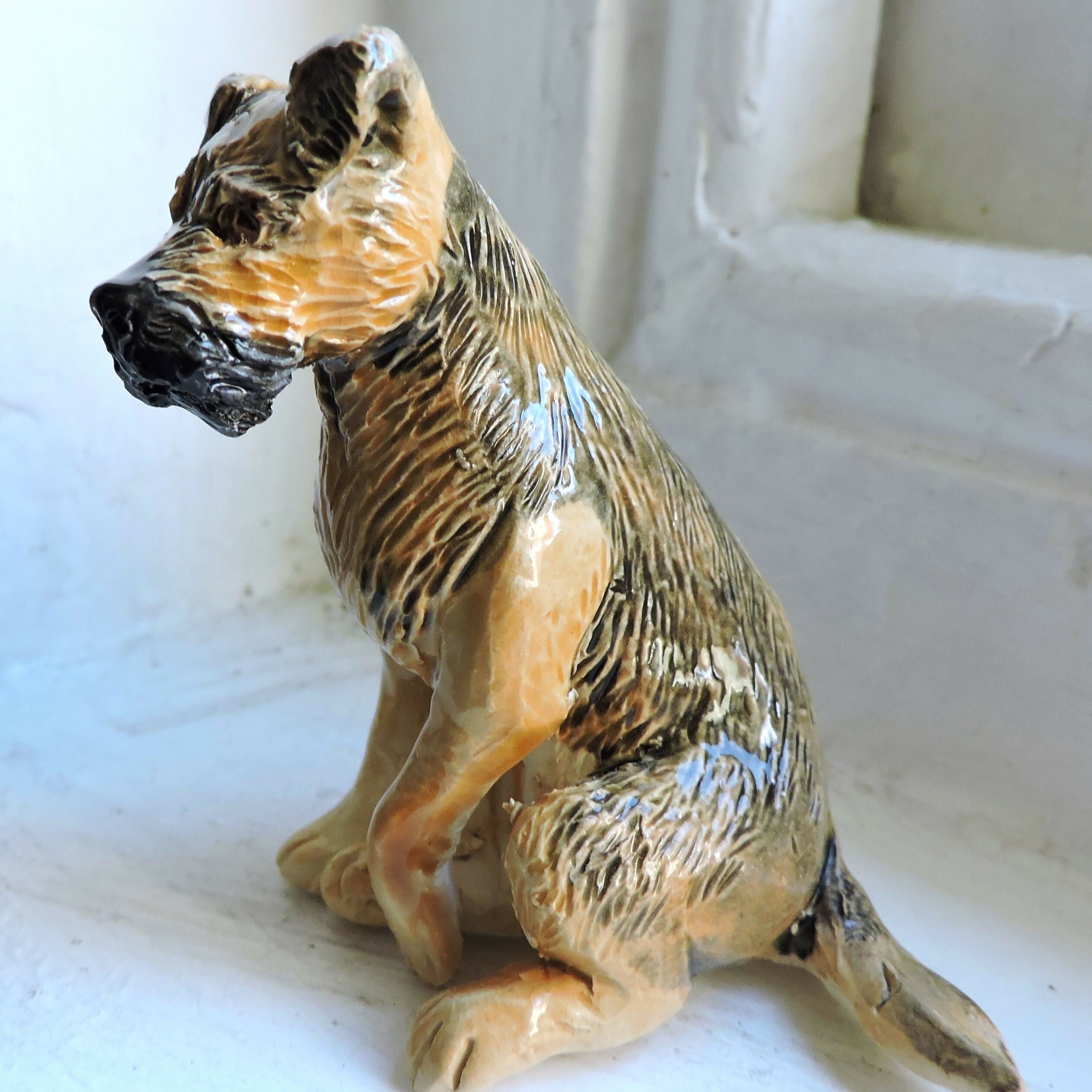 Ceramic Border Terrier dog sculpture