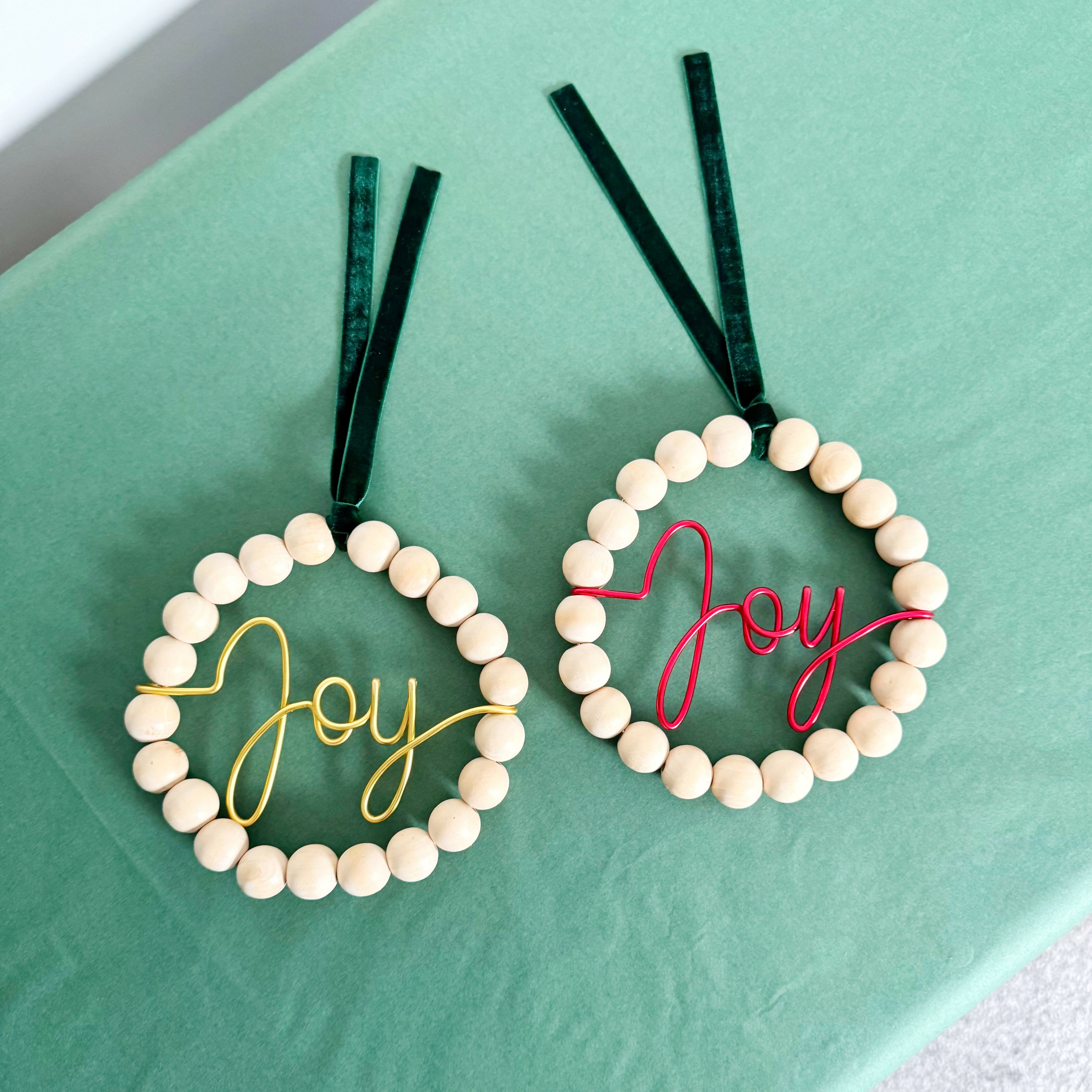 Wooden Beaded Wreath with Joy Wire