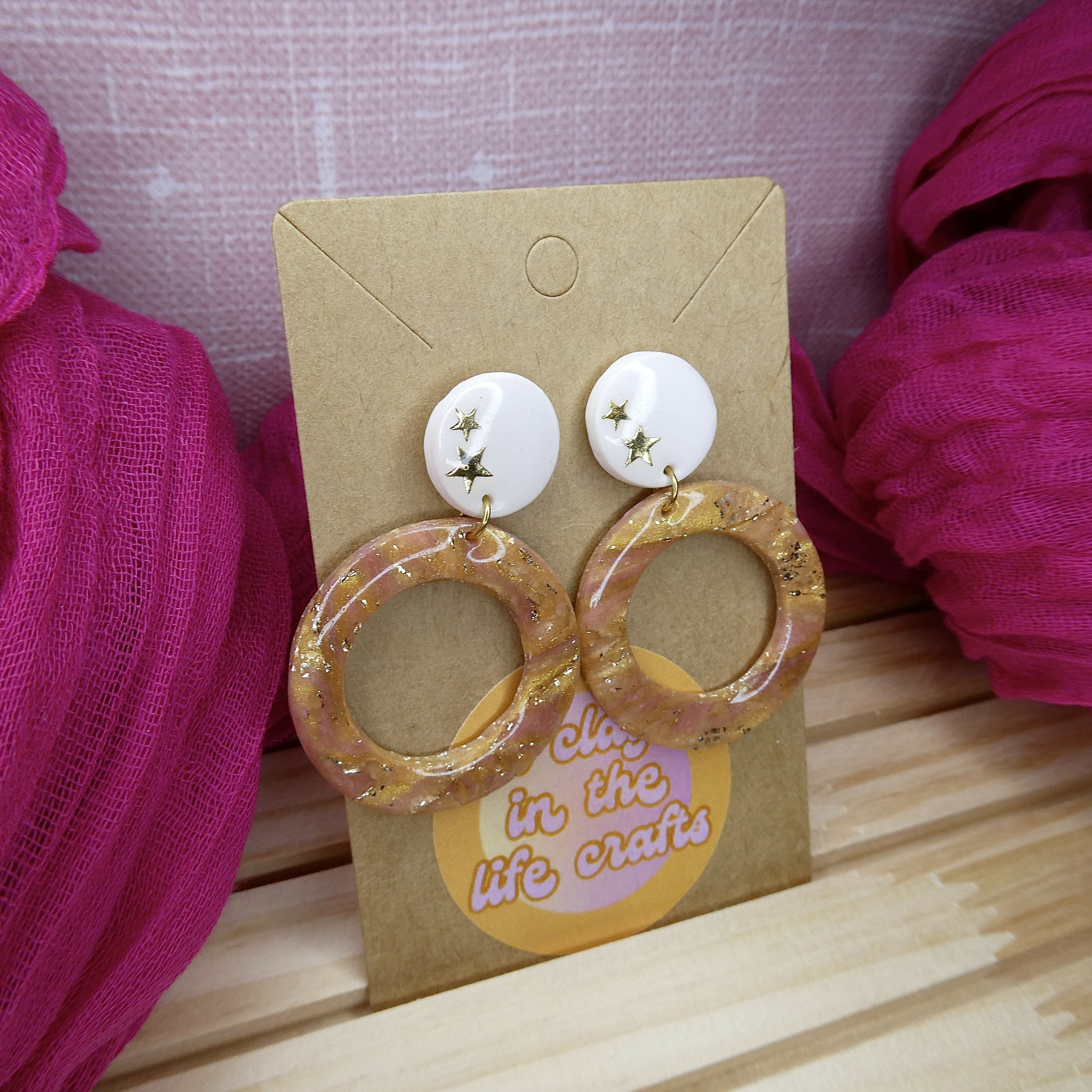 White And Nude Shimmery Earrings With Gold Star Detail