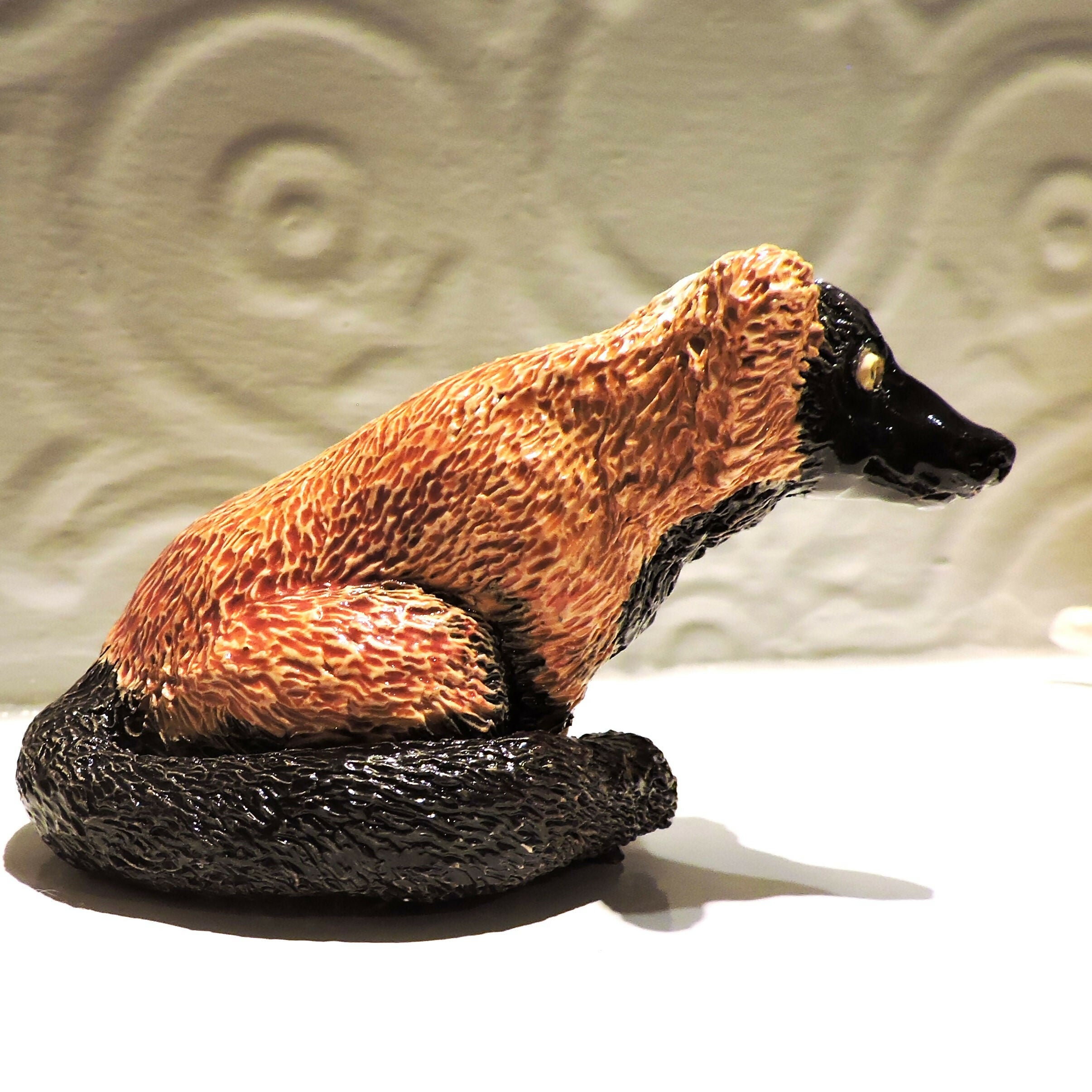 Ceramic Red ruffed lemur sculpture