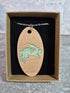 Unique Handcrafted Oval Cherry Wood Veneered Pendant With Engraved Leaping Hare
