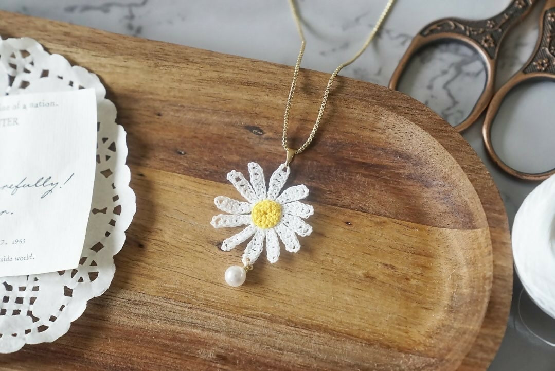 White Daisy Flower with Pearl Necklace