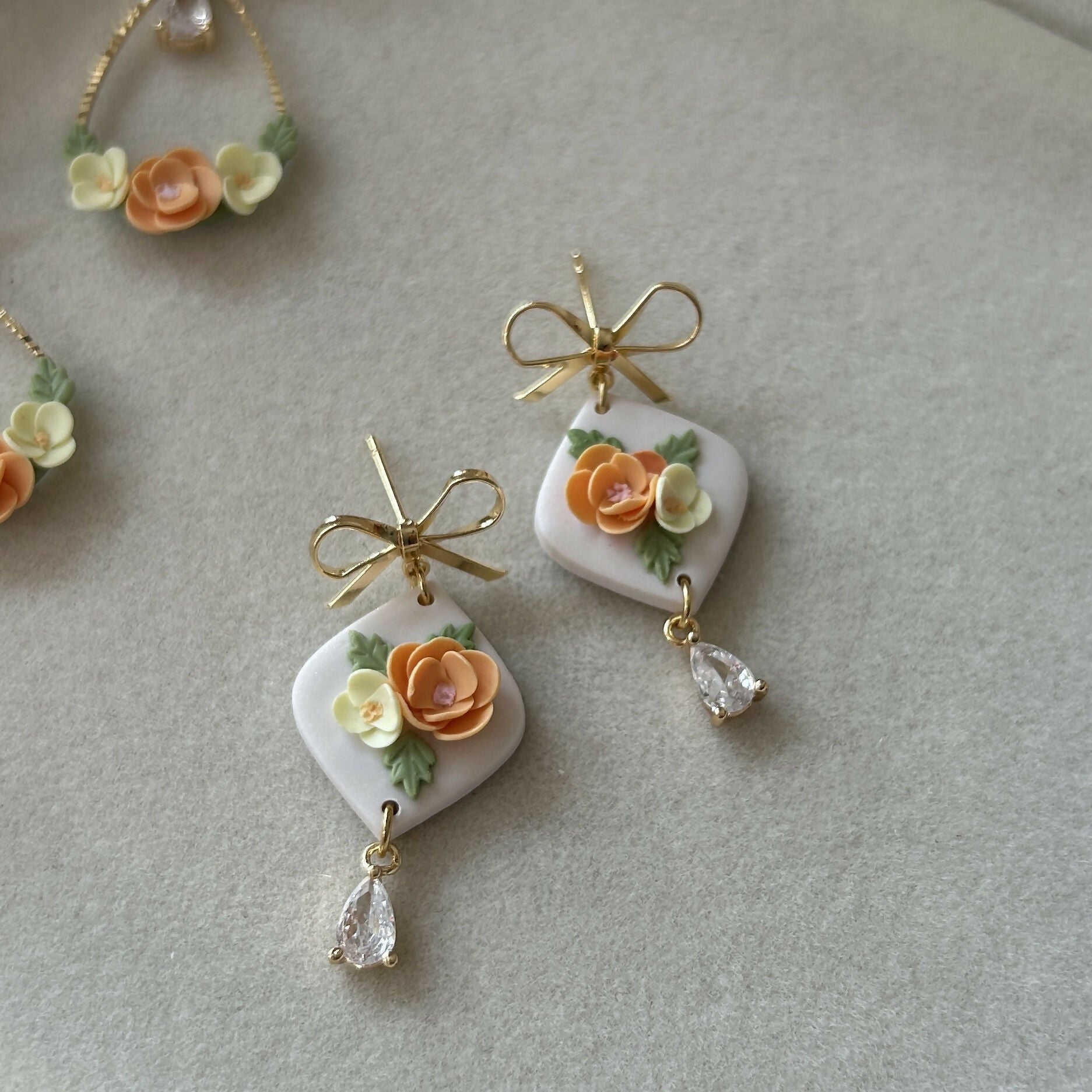 Orange and yellow floral Earrings on bow