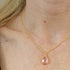 Light Powder Pink Faceted Crystal Teardop Charm Necklace on a Gold Plated Chain