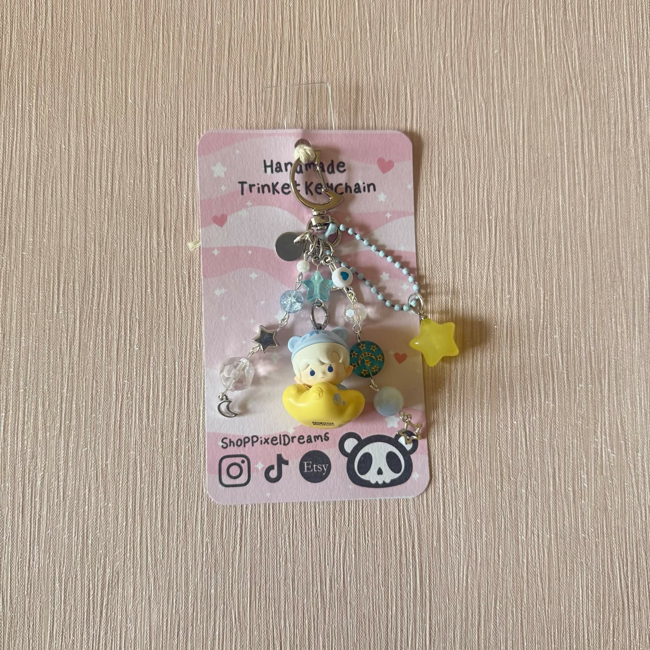 Cosmic Baby Toy Figure Beaded Trinket Keychain