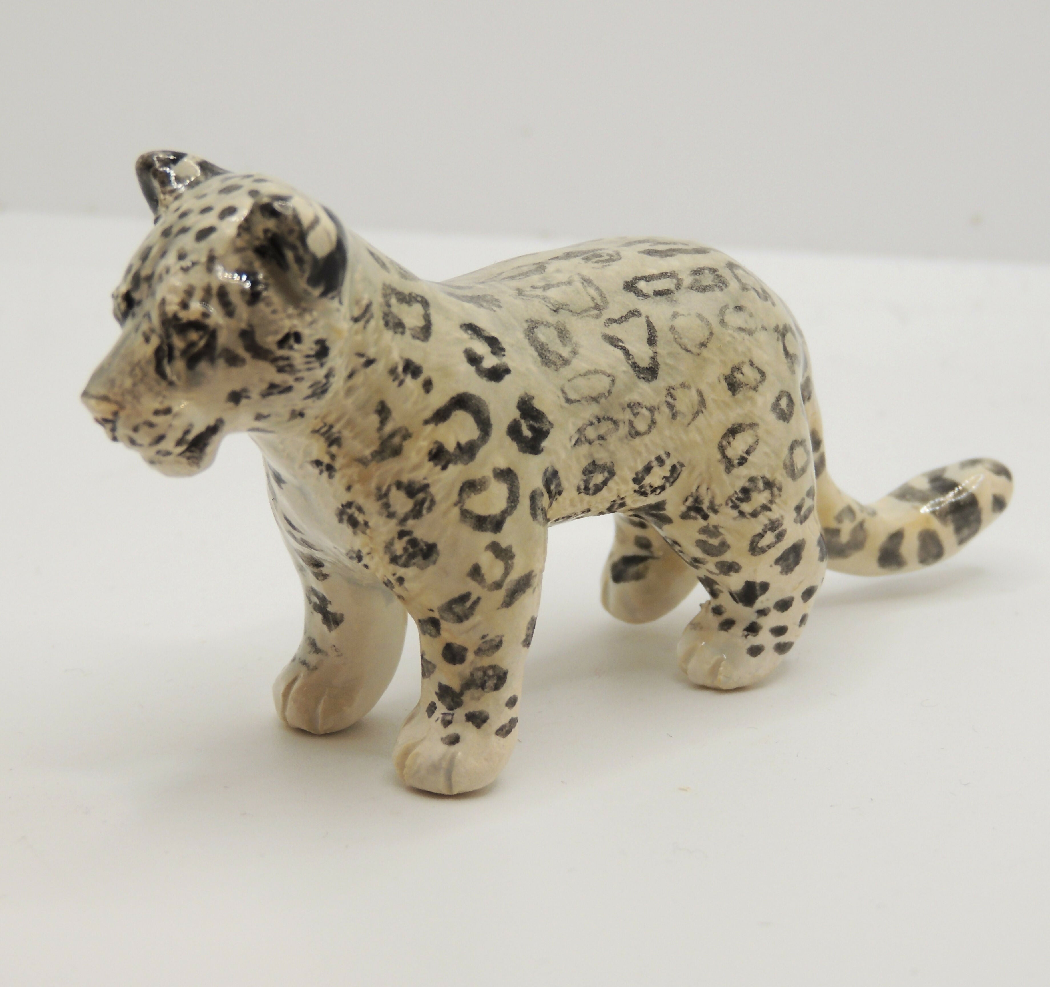 Ceramic Snow Leopard sculpture