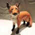 Ceramic standing fox sculpture