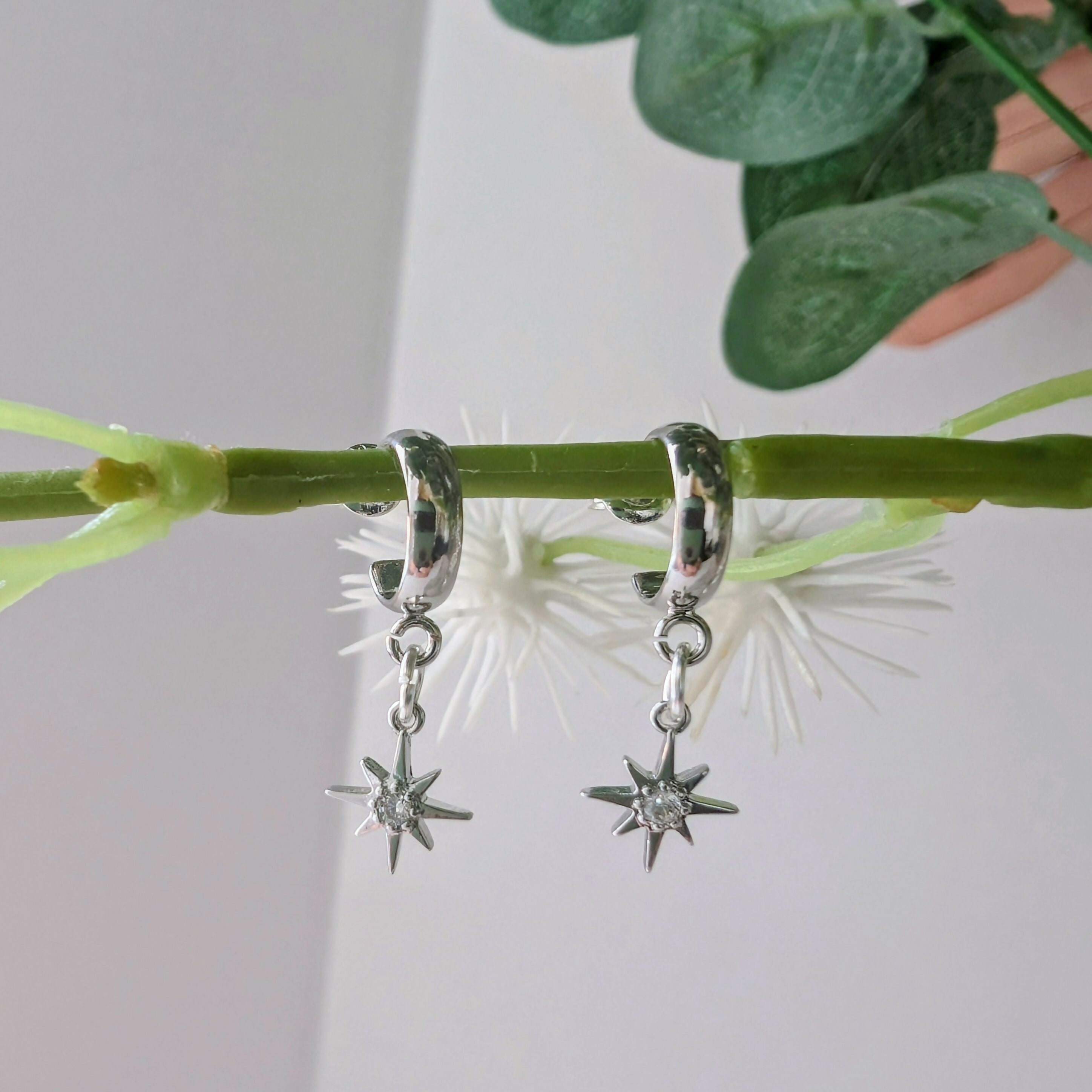 Tiny Silver Cubic Zirconia Star Earrings on a Silver Plated Half Loop Huggie Stud