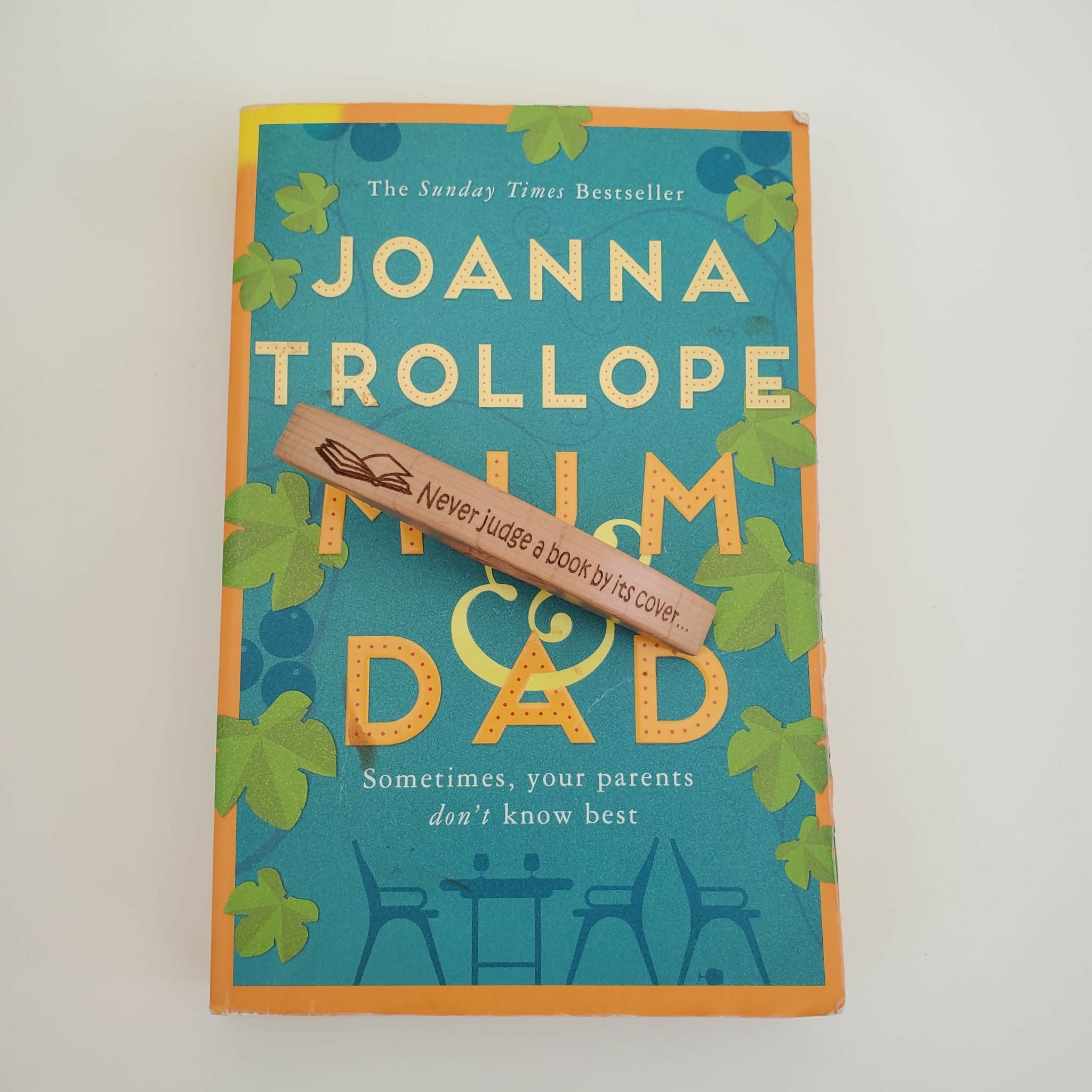 Wooden Thumb Bookmark Book Holder - Never judge a book by its cover