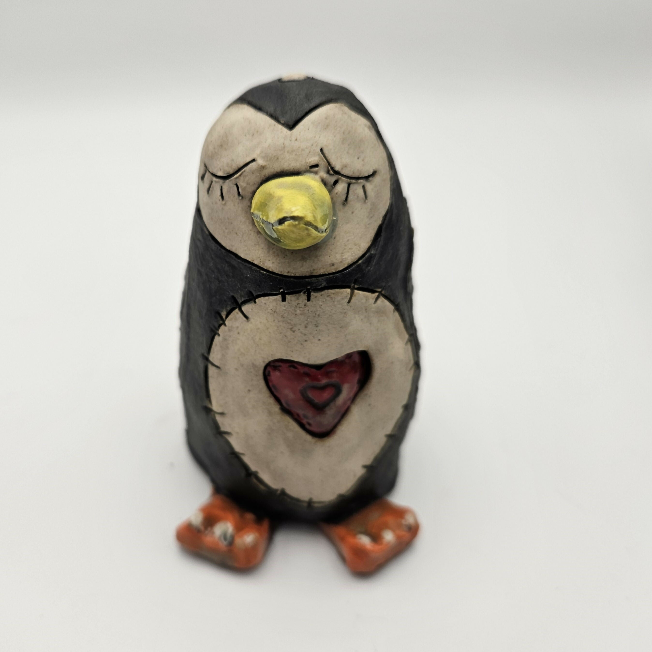 CHARMING CERAMIC PENGUIN.