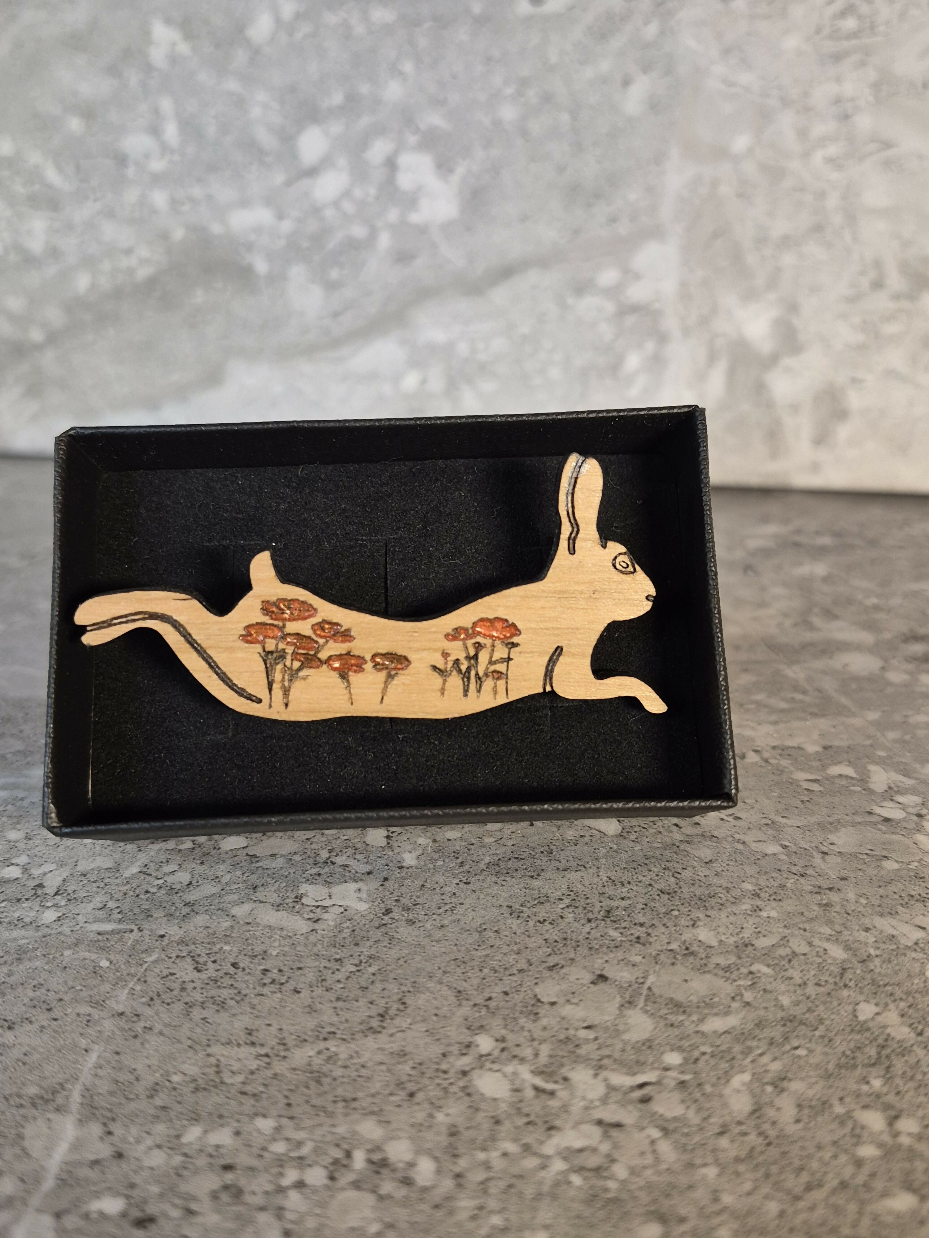 Handcrafted Cherry Veneered Leaping Hare Pin with Flower Decoration