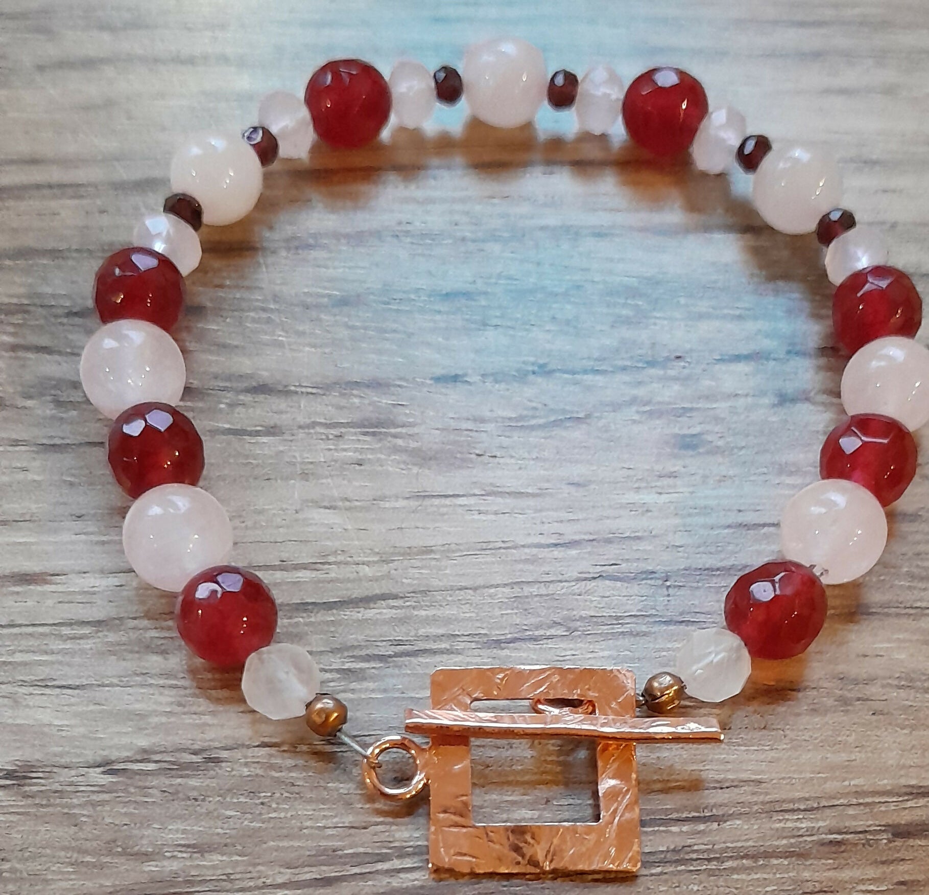 Gemstone Bracelet with Hand Finished Pure Copper Toggle Catch, Faceted Rose Quartz, Faceted Red Chalcedony, Rose Quartz and Tiny Faceted Red Chalcedony.