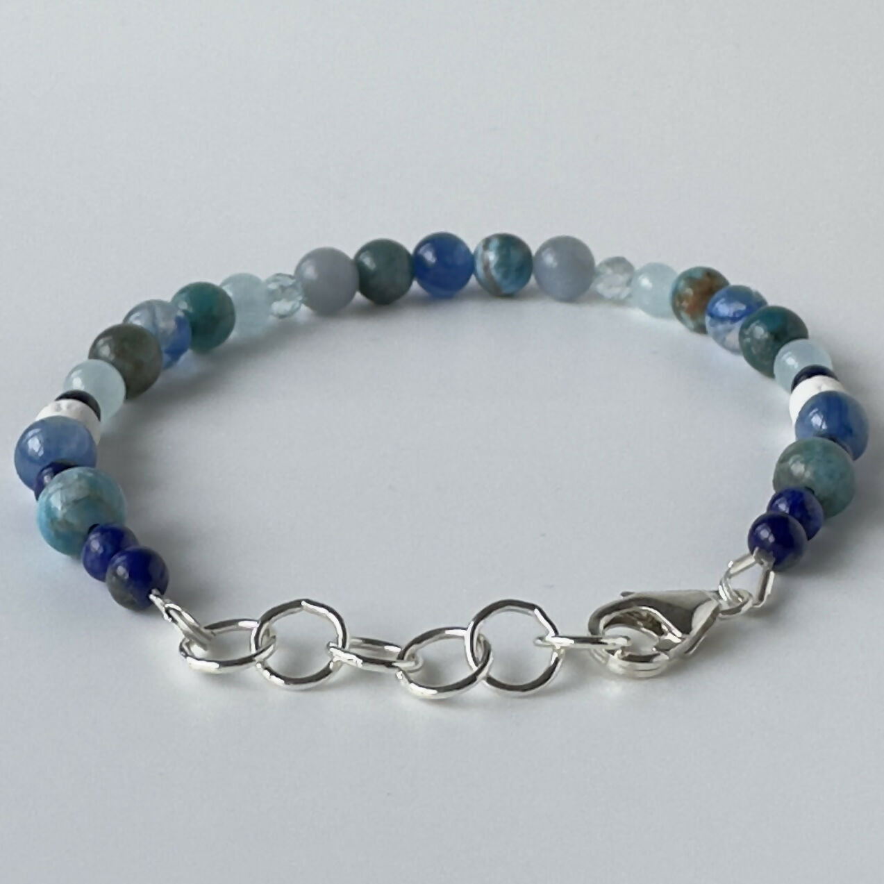 HEALING CRYSTAL & STERLING SILVER THROAT CHAKRA BRACELET WITH AROMATHERAPY BEADS