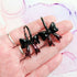 Handmade Black And Burgundy Glitter Resin Bow Charms On Black Hoops