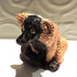 Ceramic Red ruffed lemur sculpture