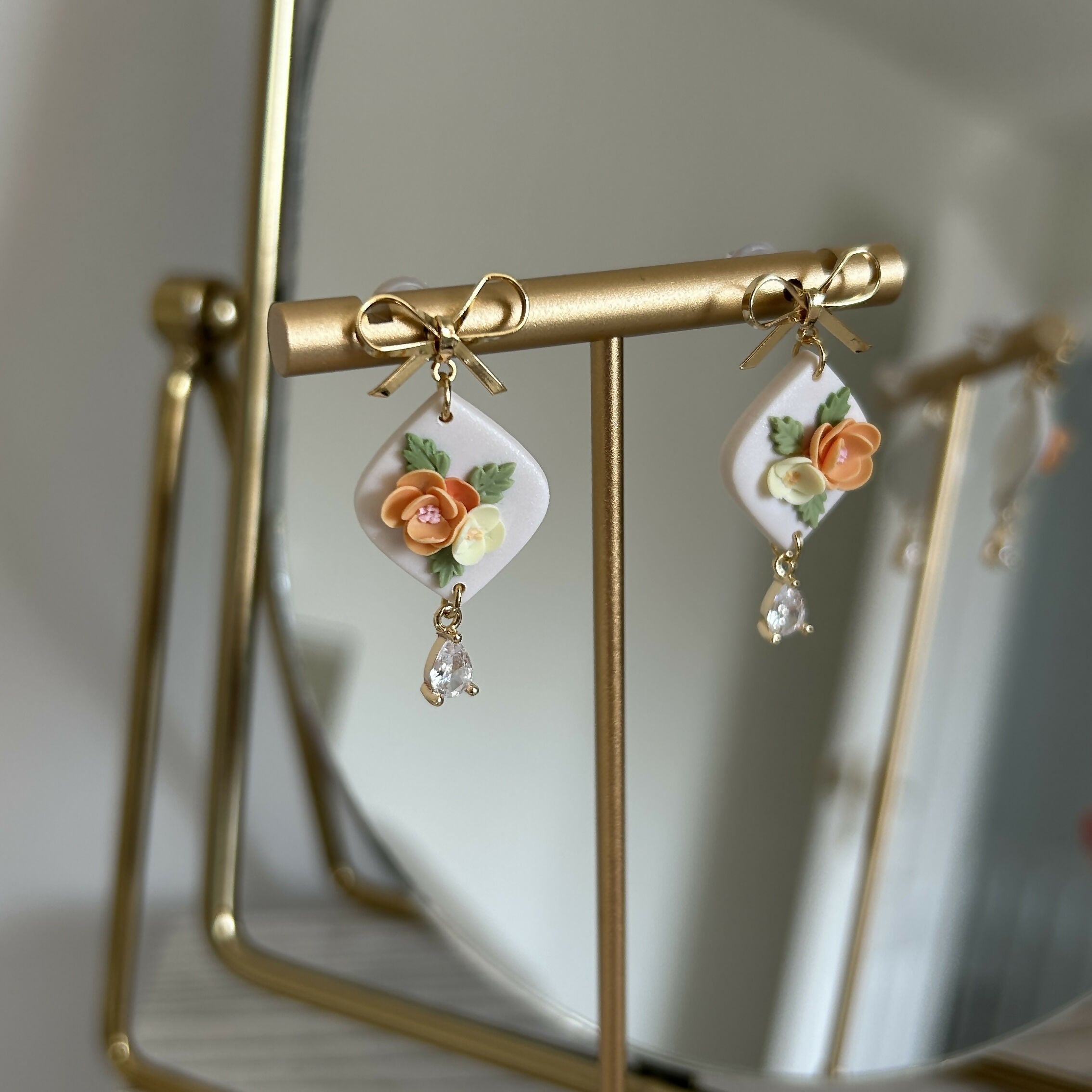 Orange and yellow floral Earrings on bow