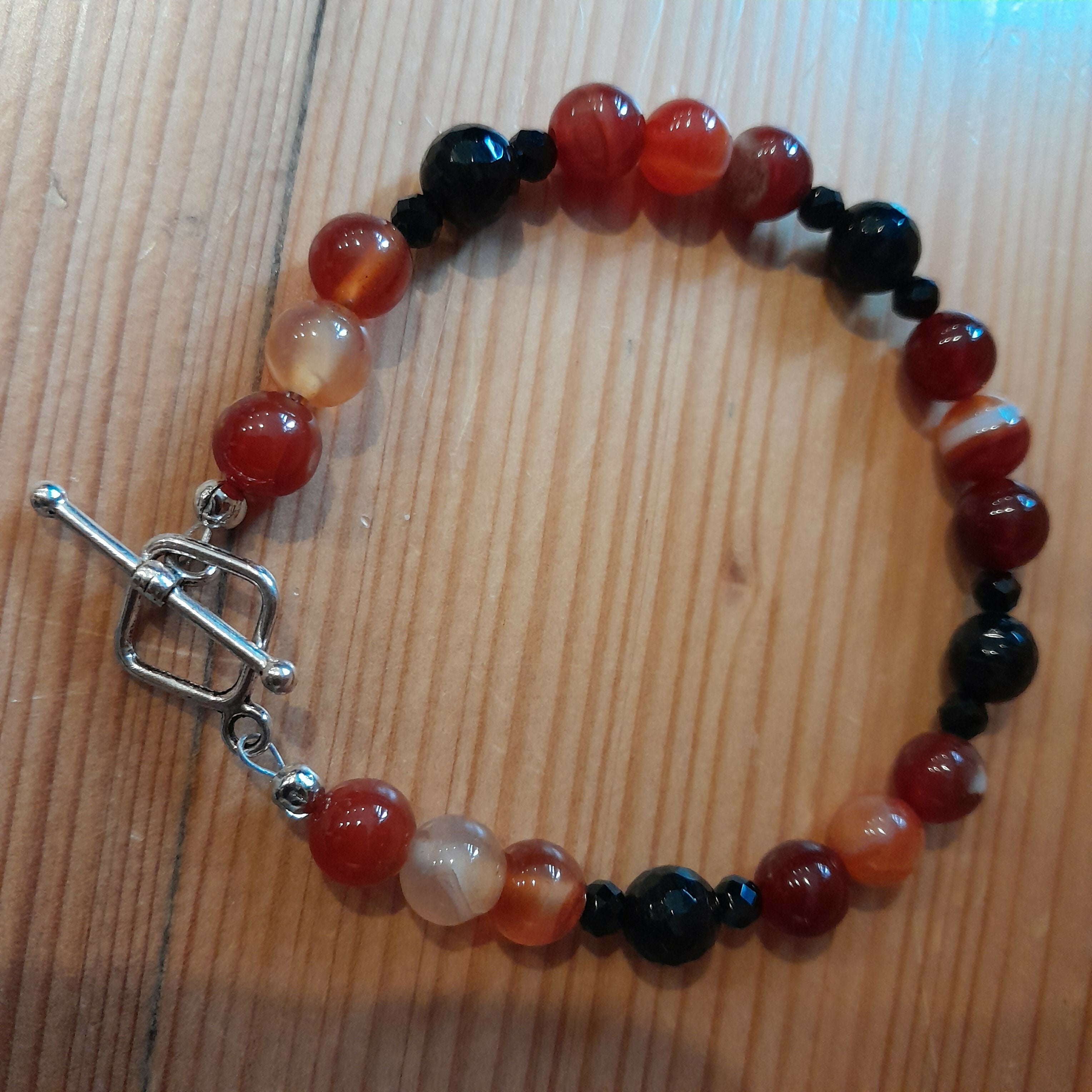 Tibetan Silver Toggle Catch with Carnelian and Faceted Onyx.