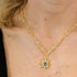 Gold Starburst Necklace with Deep Purple Stone on Gold Plated Deco Oval Chain