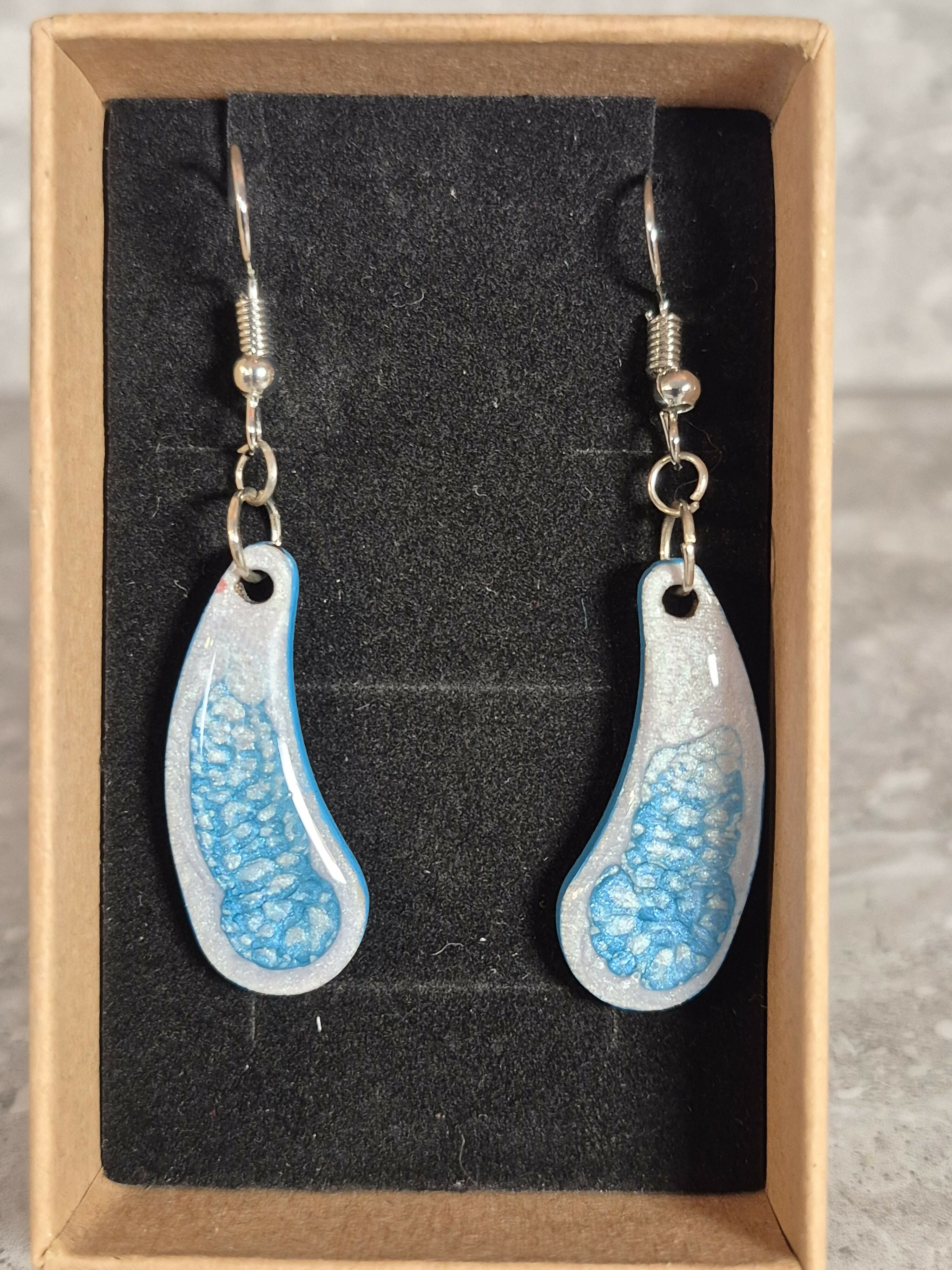 Handcrafted Teardrop Shaped Silver And Cyan Earrings