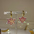 STAR HOOP WITH GOLD ENGRAVED SNOWFLAKE DESIGN