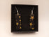 Yellow and Green Stars on Black Earrings