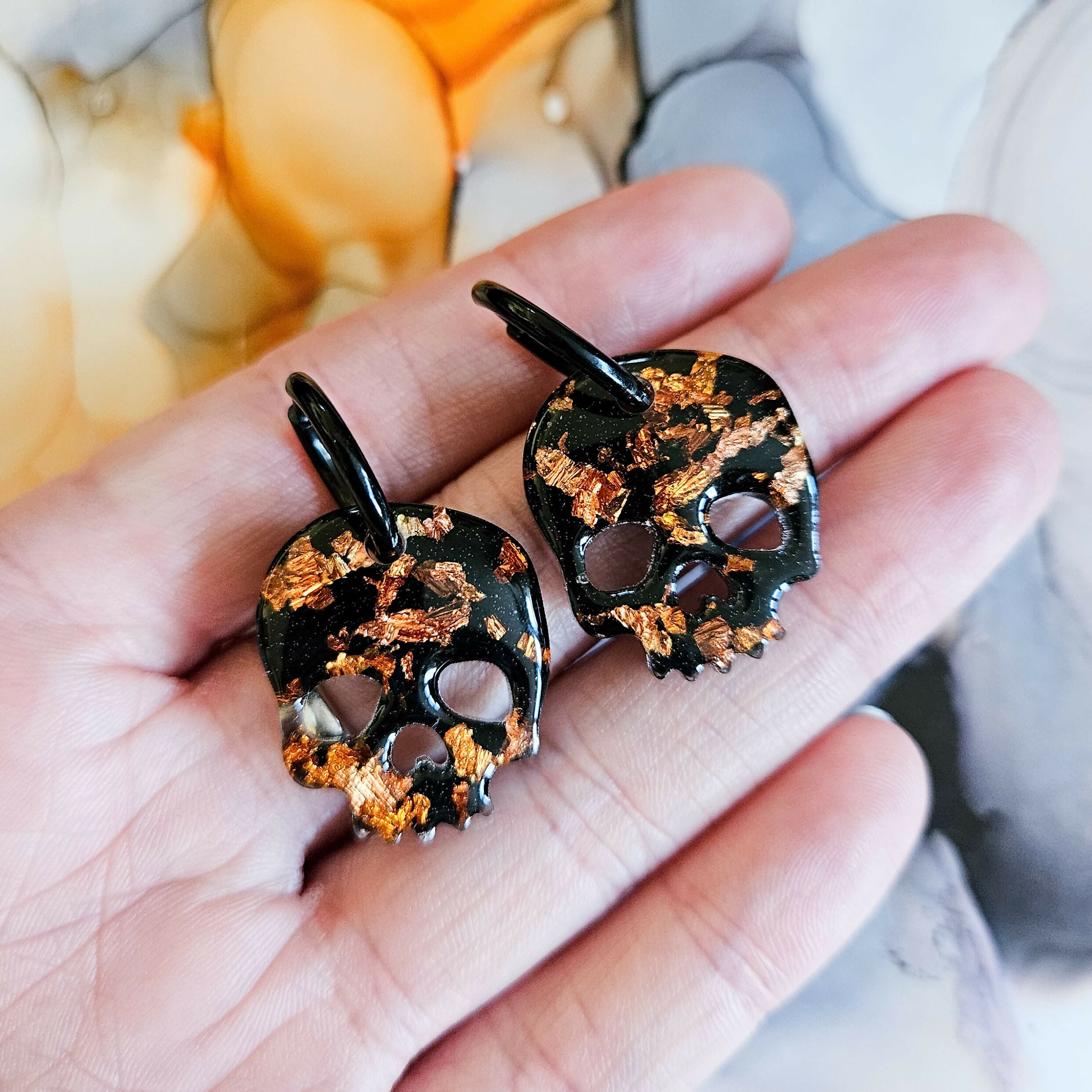 Handmade Black And Orange Resin Skull Charms On Black Hoop