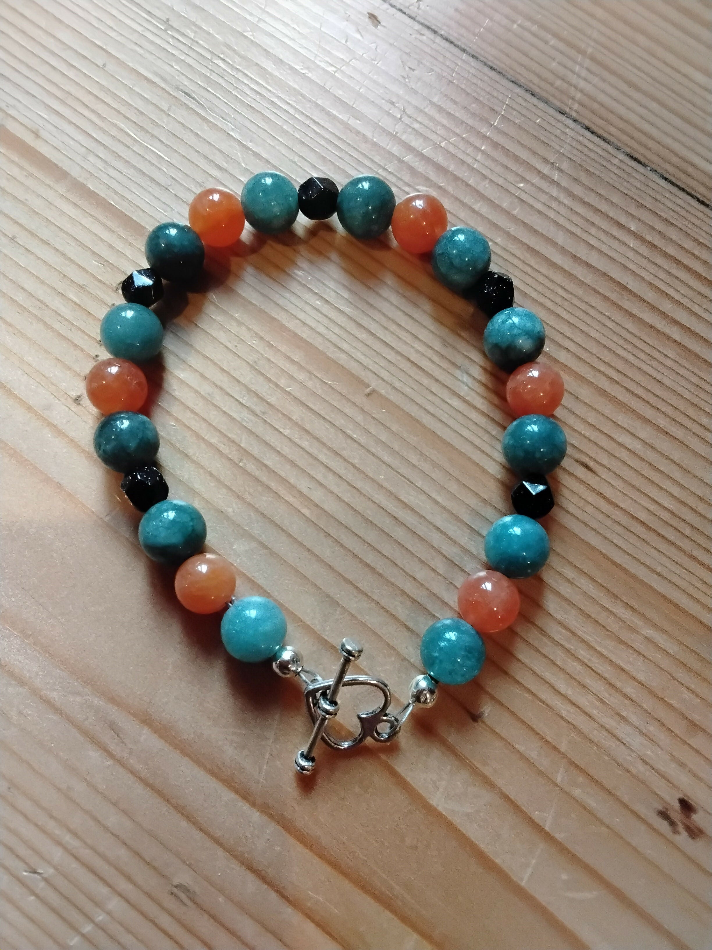 Tibetan Silver Toggle Catch Bracelet with Smokey Blue Chalcedony, Orange Chalcedony and Faceted Navy Goldstone.