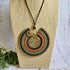 Large Green Macramé Necklace; Full Moon Boho Statement Pendant with Gold Spiral