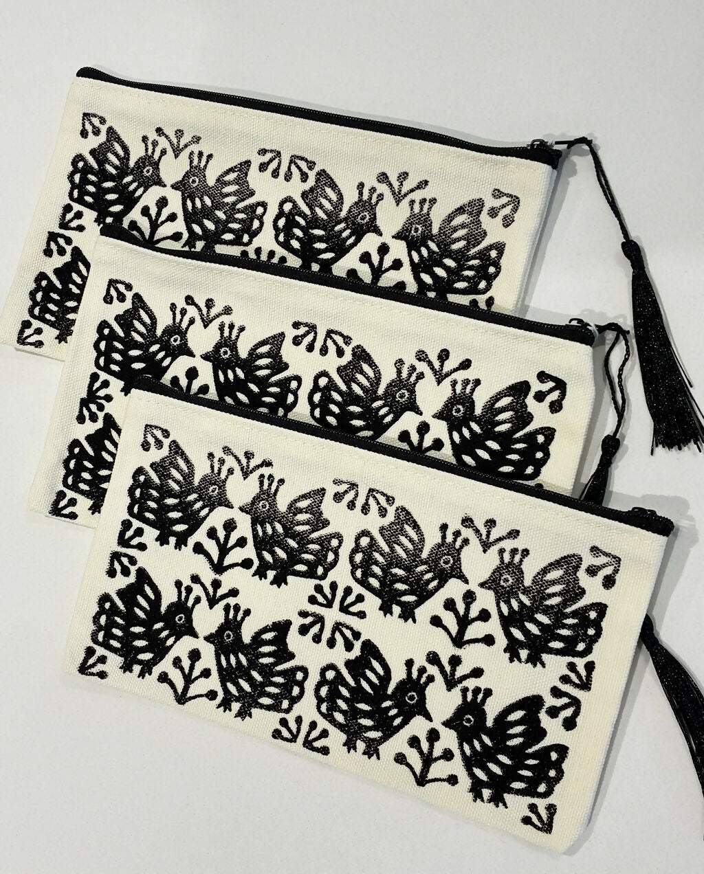 Hand-printed Zip Pouch with Black-Crested Bird Design.