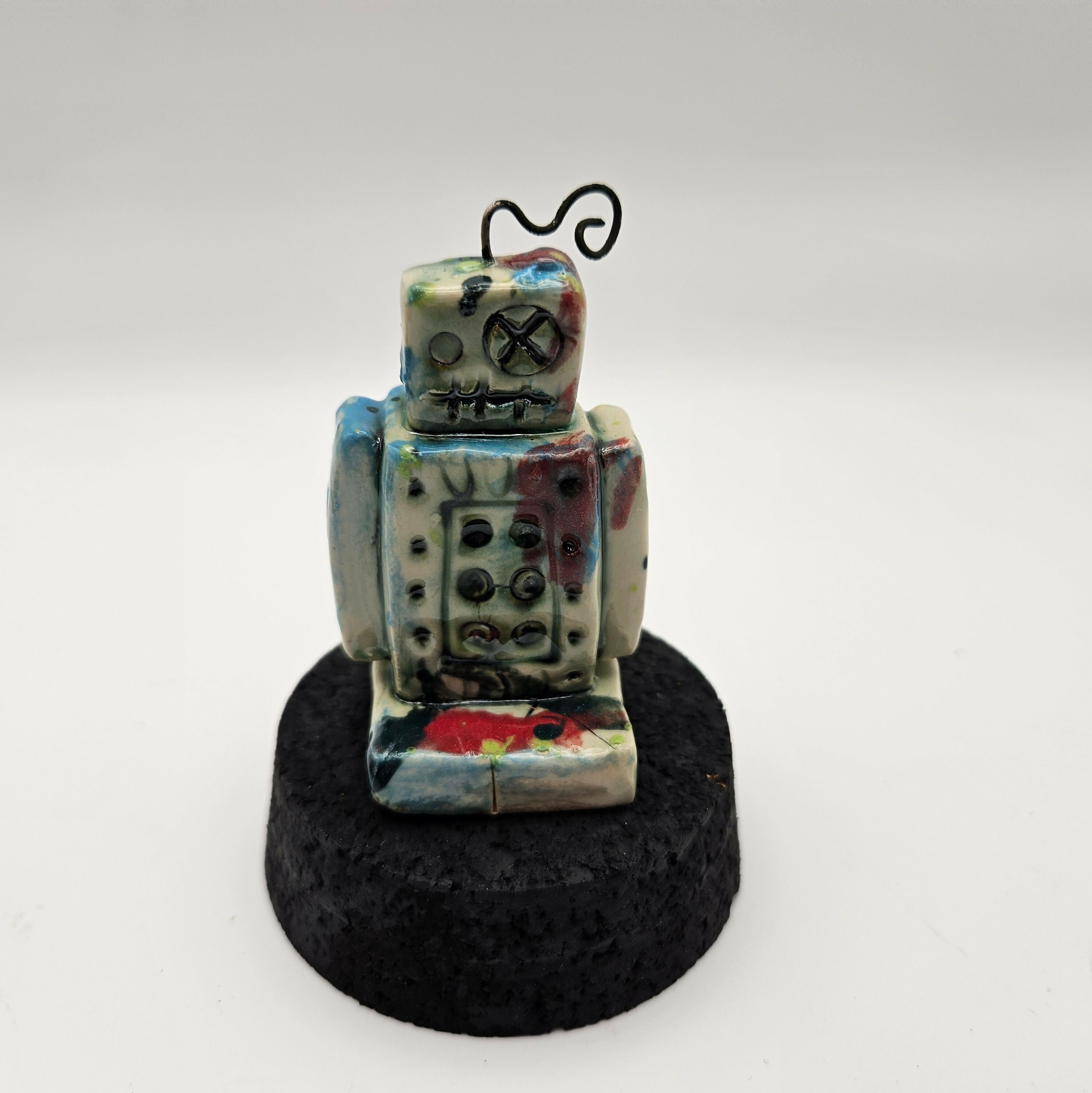 QUIKRY CERAMIC 'MINIBOTS' IN A GLASS CLOCHE