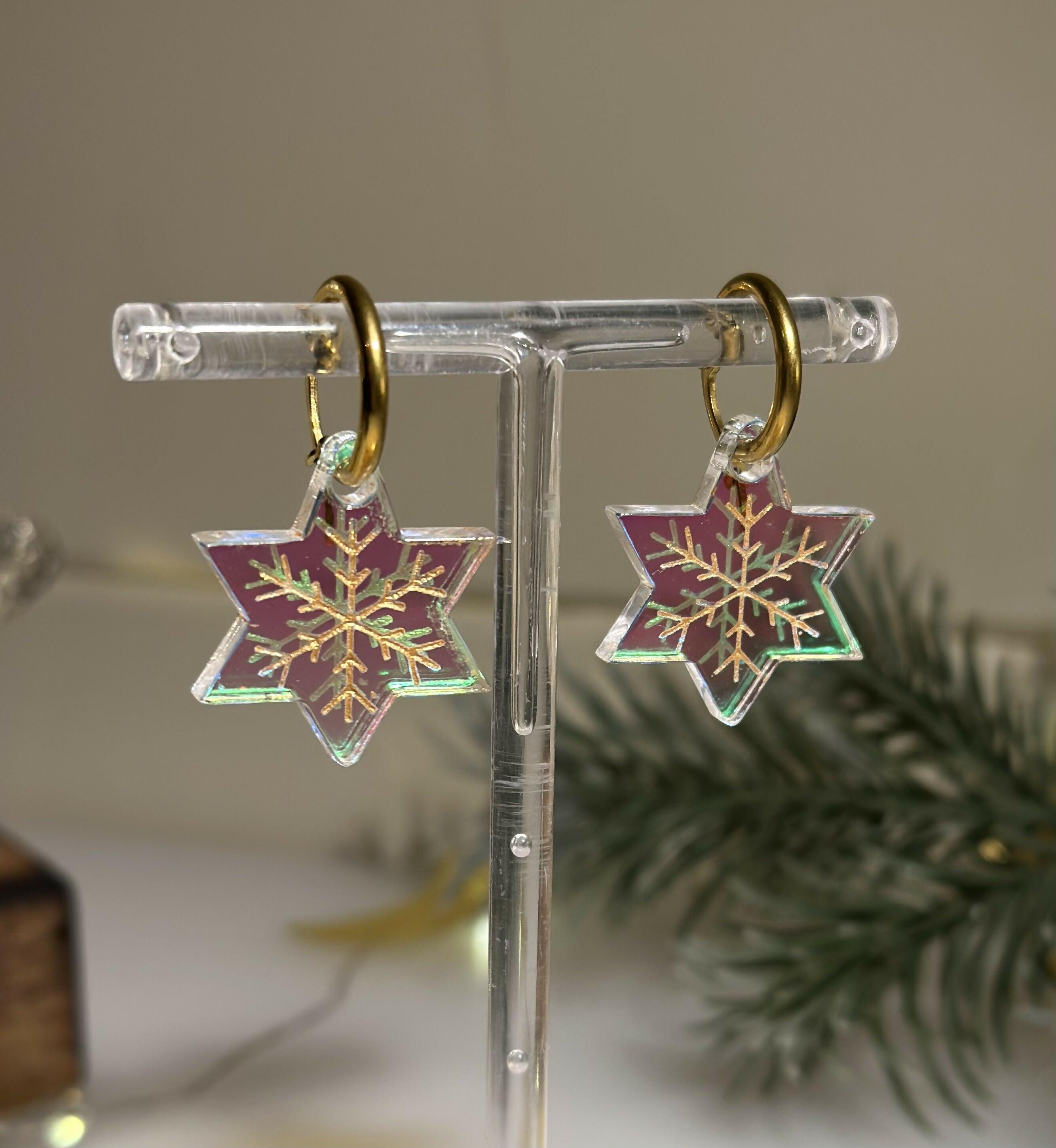 STAR HOOP WITH GOLD ENGRAVED SNOWFLAKE DESIGN