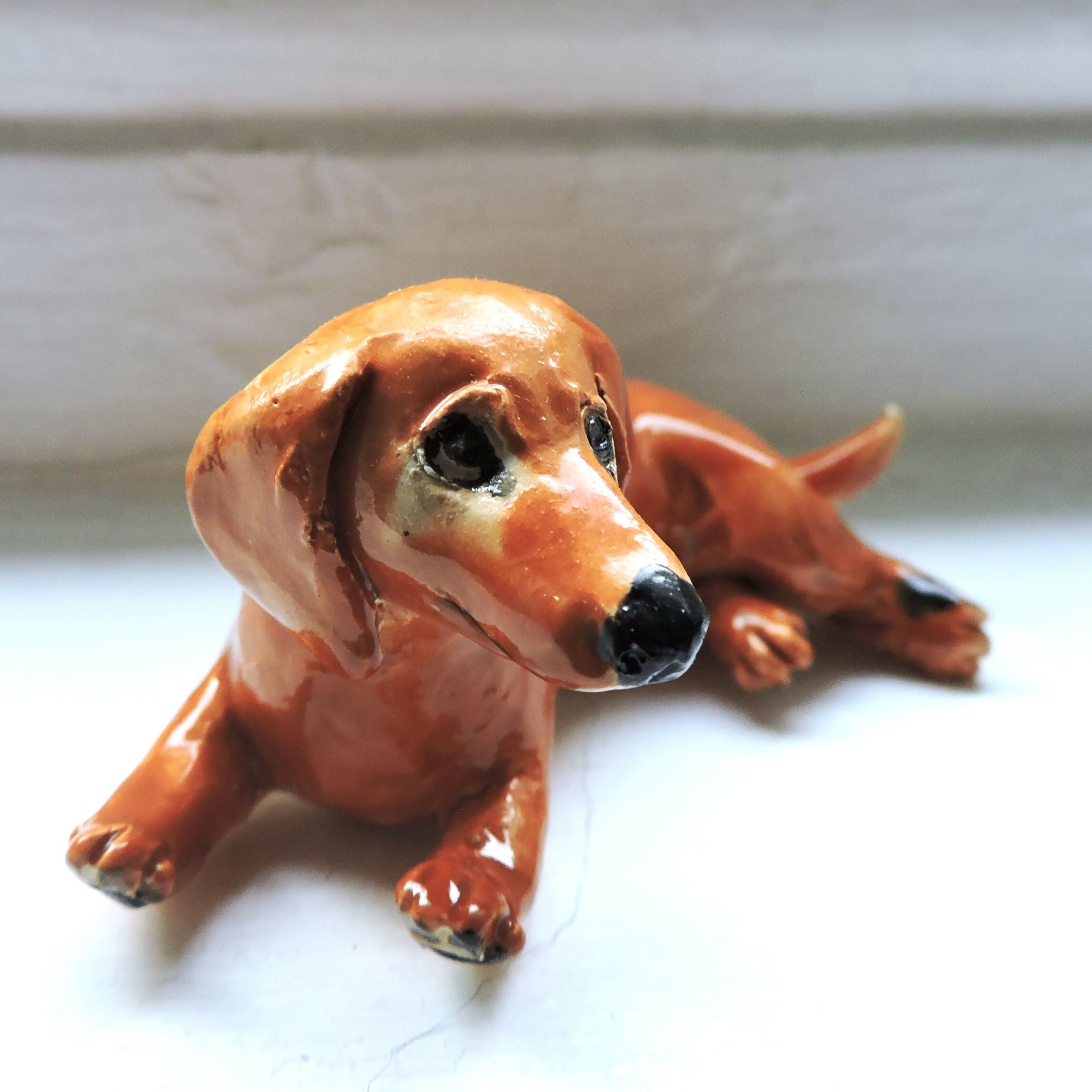 Ceramic red Dachshund dog sculpture