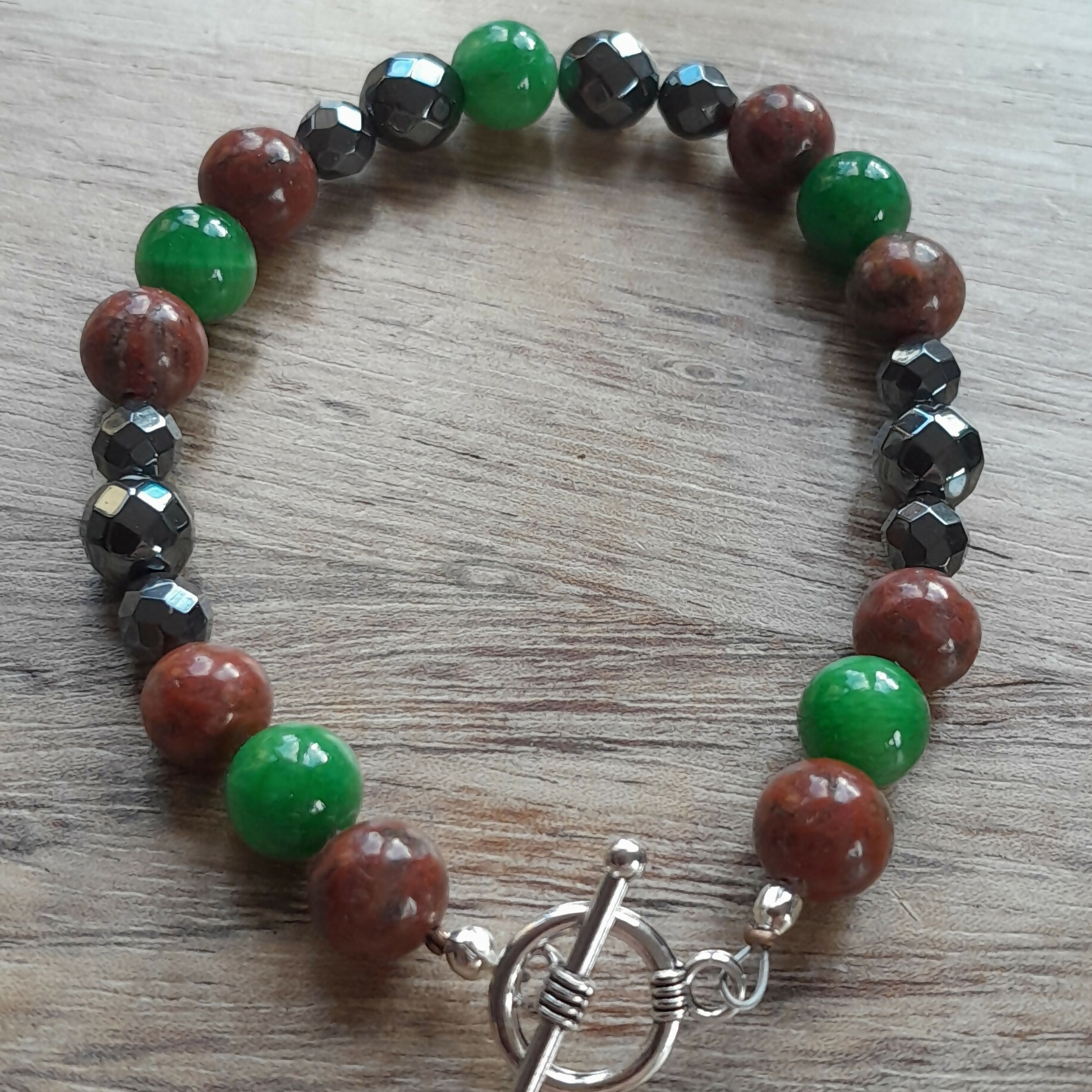 Tibetan Silver Toggle Clasp Bracelet with Red Jasper, Green Chalcedony and Faceted Grey Hematite.