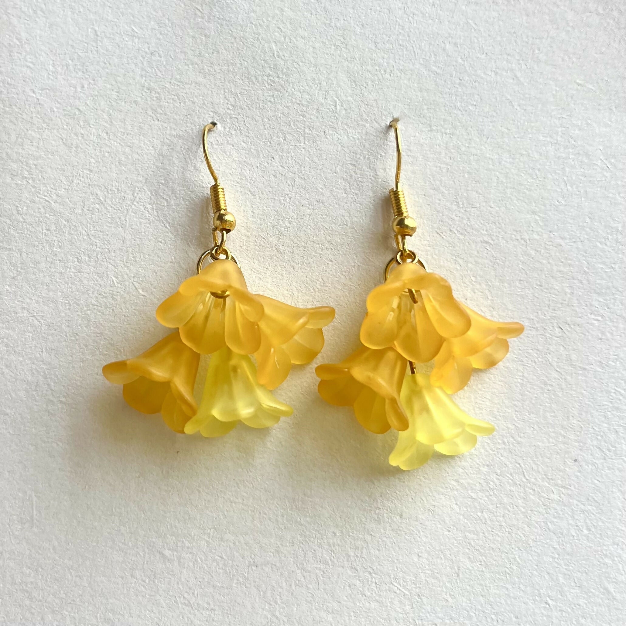 Cascading Orange And Yellow Flower Earrings In Gold