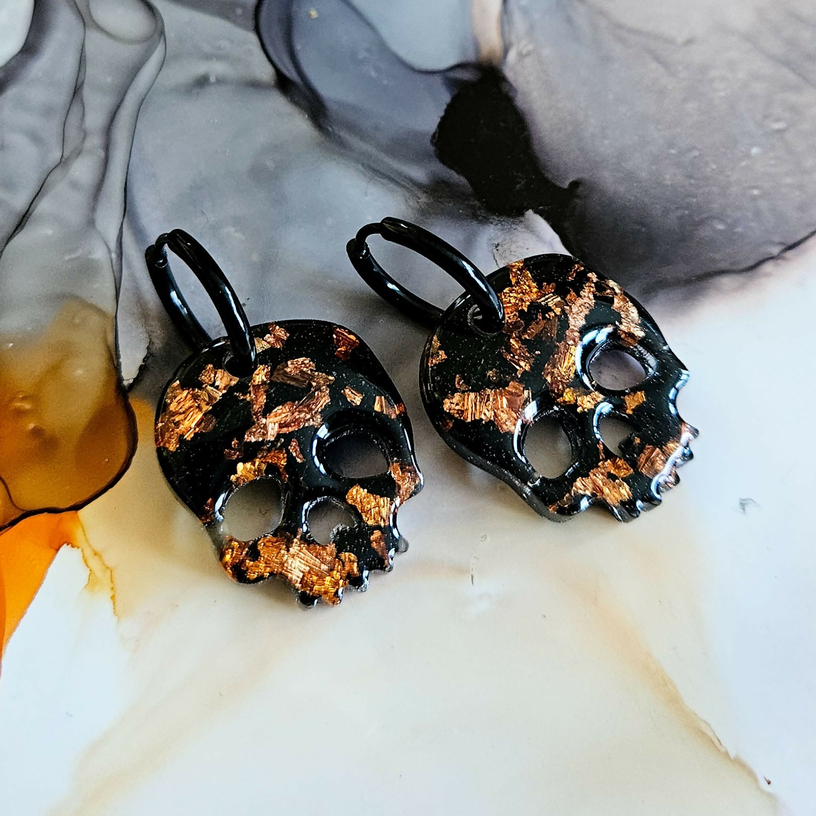 Handmade Black And Orange Resin Skull Charms On Black Hoop