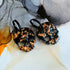 Handmade Black And Orange Resin Skull Charms On Black Hoop