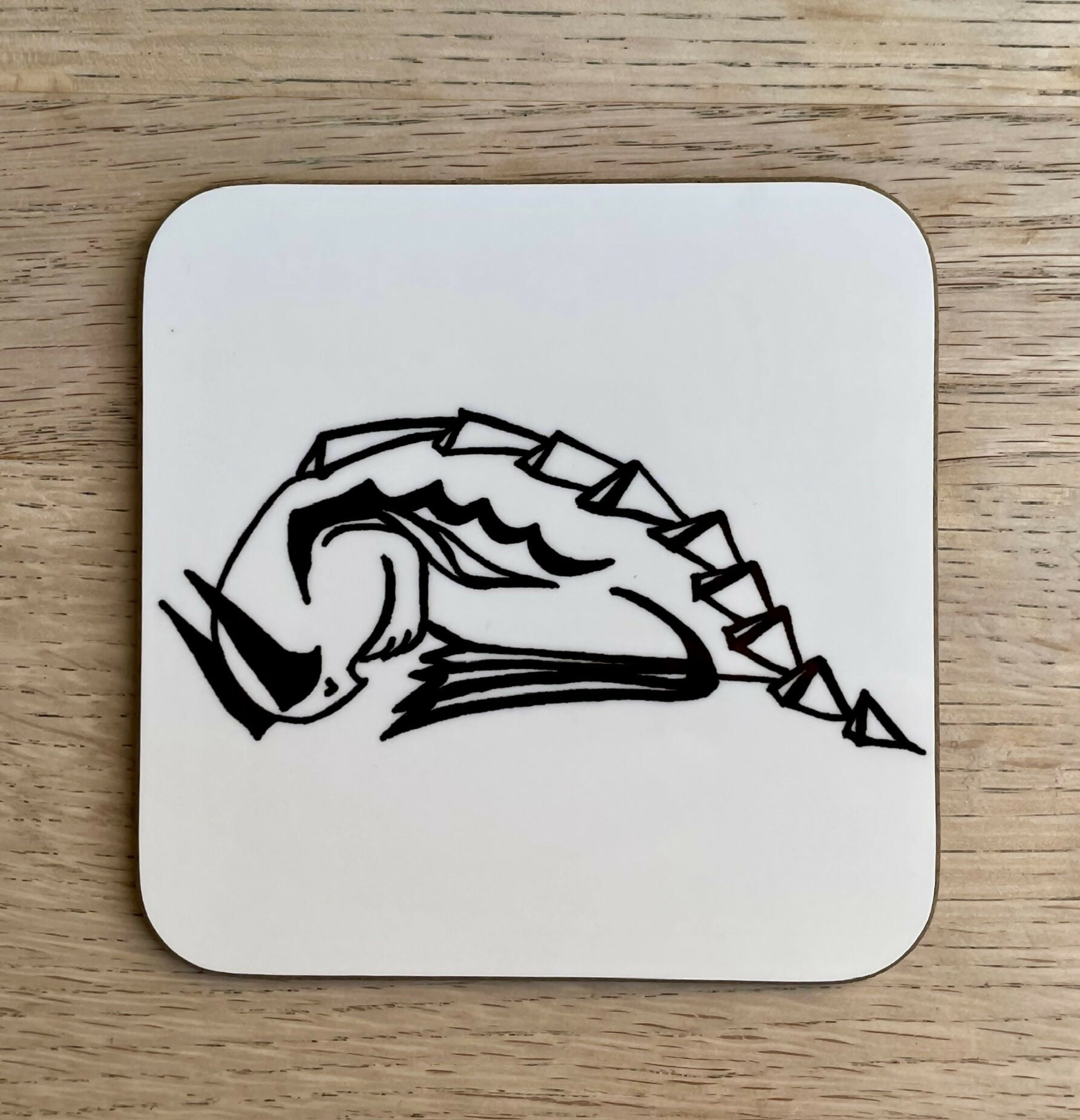 Angular Creature Coaster – Pen And Ink Design