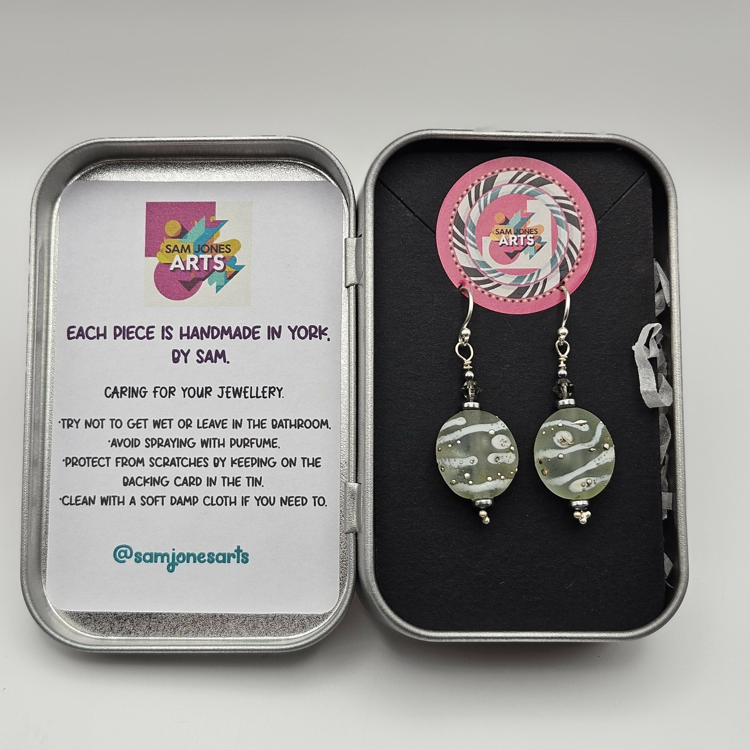 HAND LAMPWORKED ETCHED DROP GLASS EARRINGS, WITH STERLING SILVER EAR WIRES AND SWAROVSKI CRYSTALS.