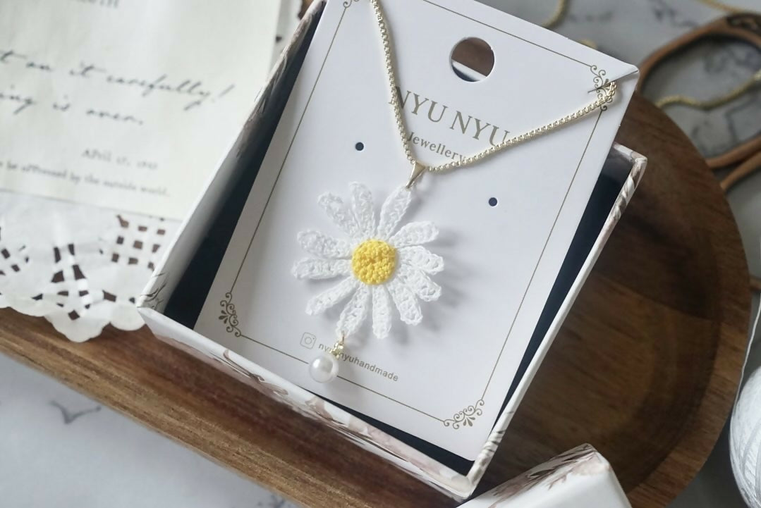 White Daisy Flower with Pearl Necklace