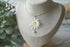 White Daisy Flower with Pearl Necklace