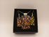 Green, Orange and Yellow Leaf Dichroic Pattern on Black Pendant set