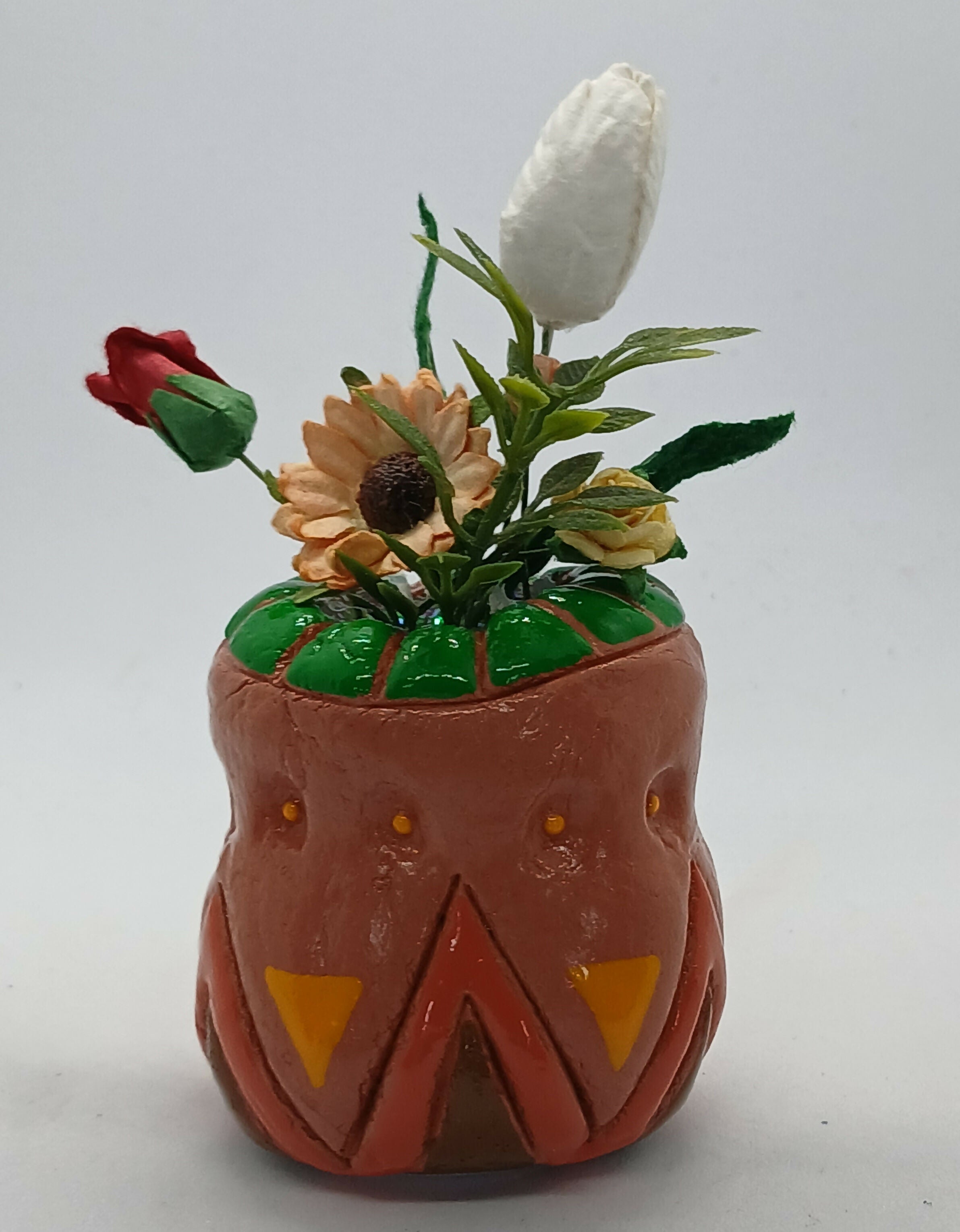 Small Clay Vase and Faux Flowers