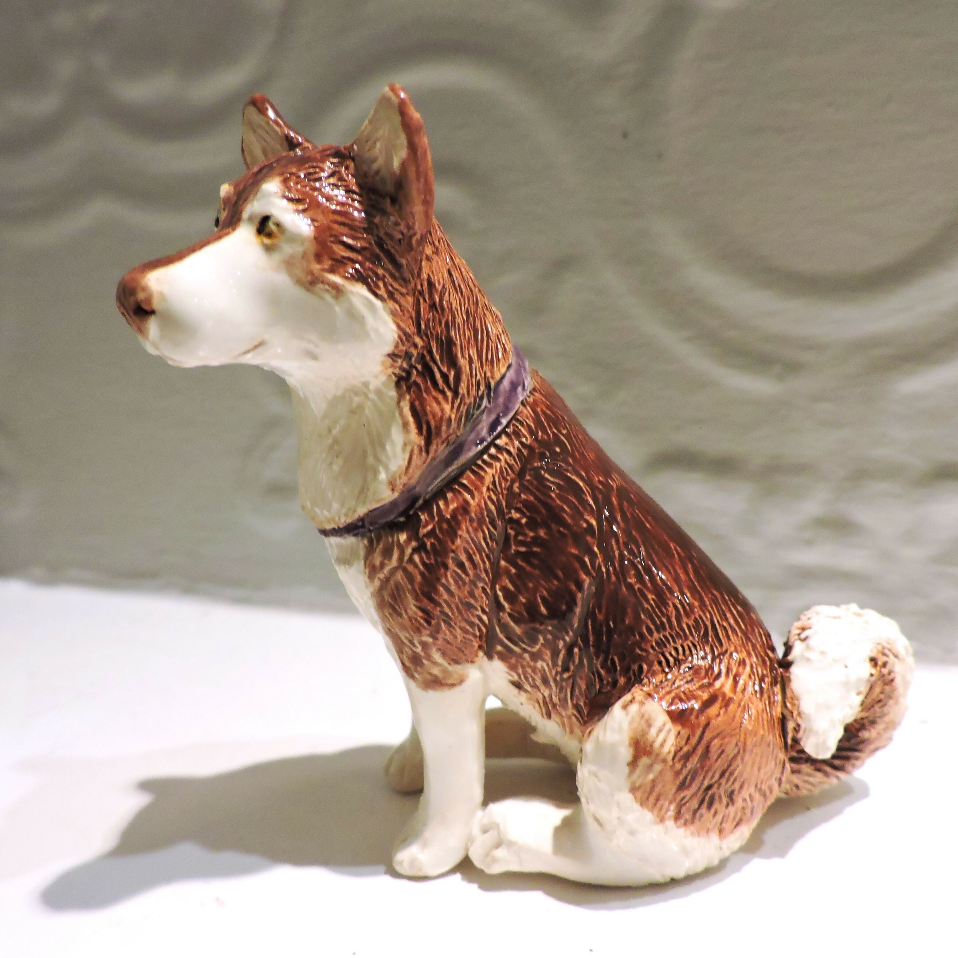 Ceramic husky dog sculpture