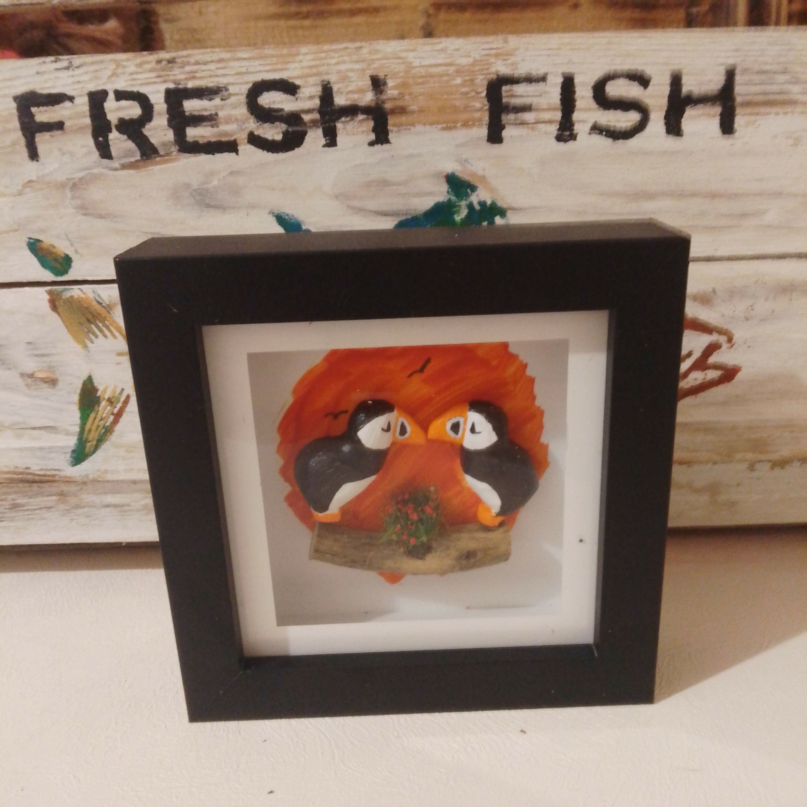 2 Puffins In Box Frame, Orange Background