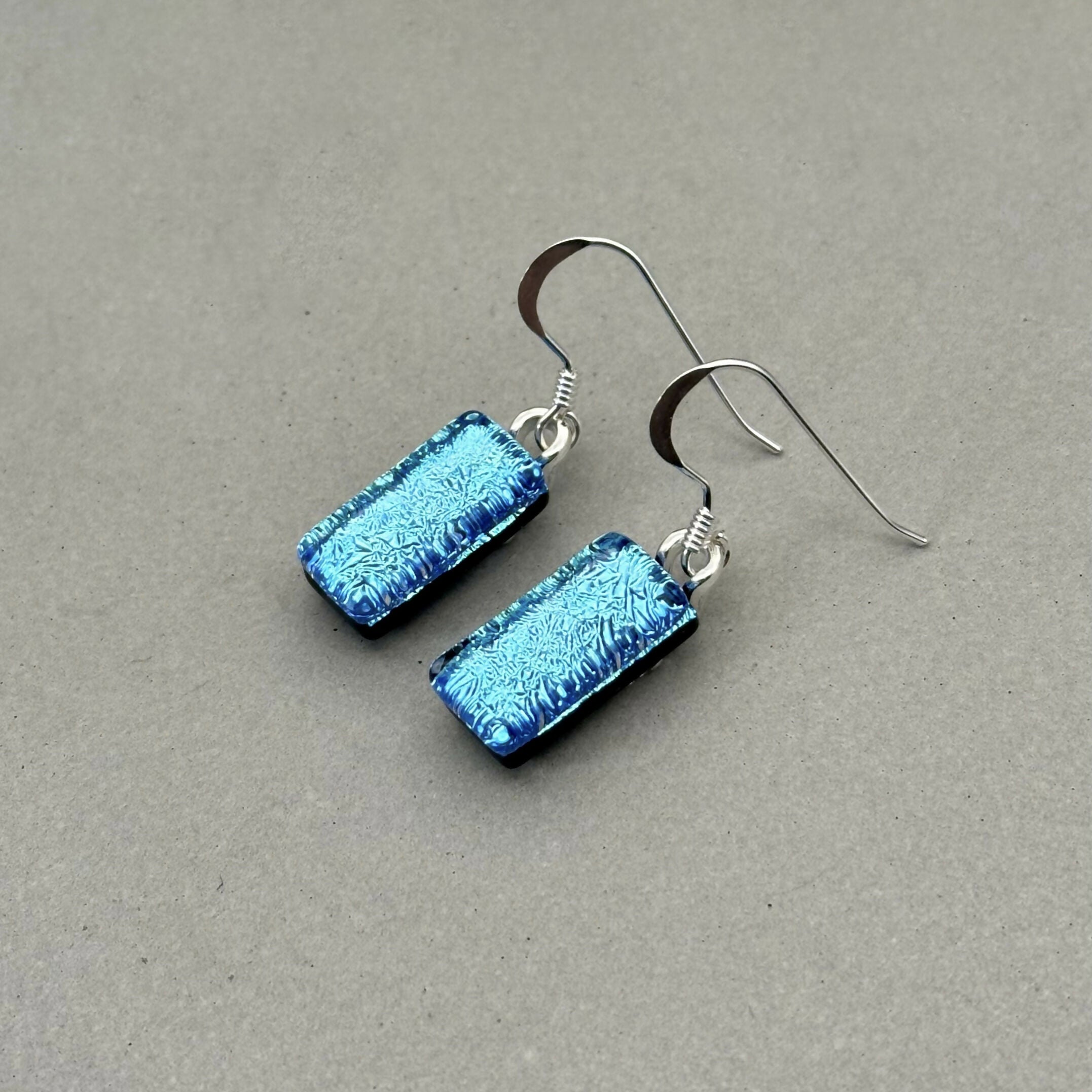 Ice Blue Dichroic Fused Glass Dangle Sterling Silver Earrings - Handmade by Jade Tapson Glass.