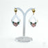 Floral Drop Earrings with Embossed Texture and Gold Detail in Pastel Pink