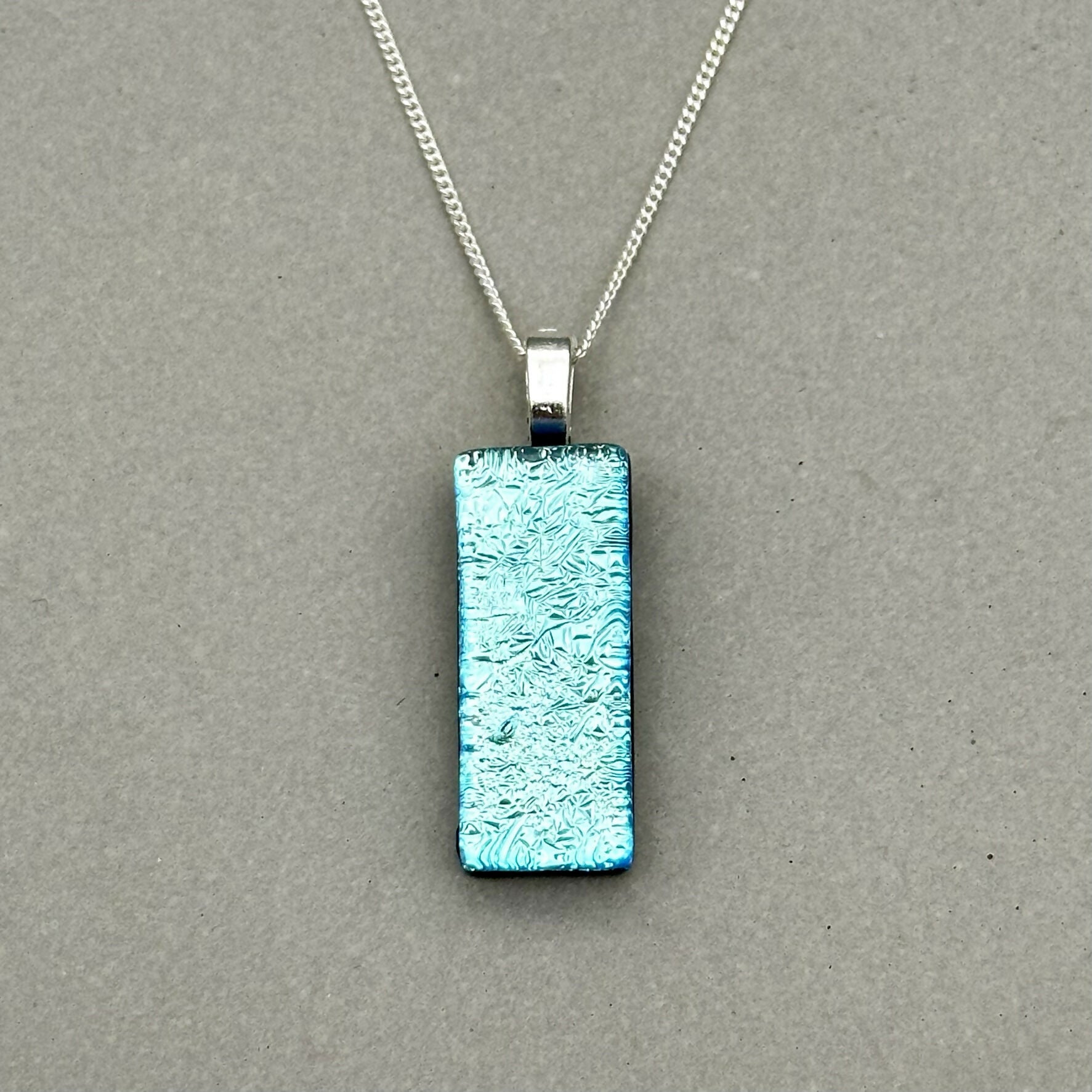 Ice Blue Dichroic Fused Glass Pendant with Silver Plated Chain - Handmade by Jade Tapson Glass.